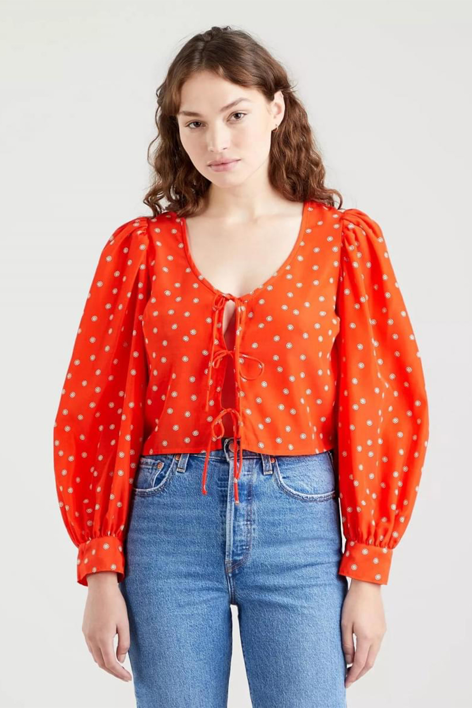 Жіноча помаранчева блуза з візерунком 1
