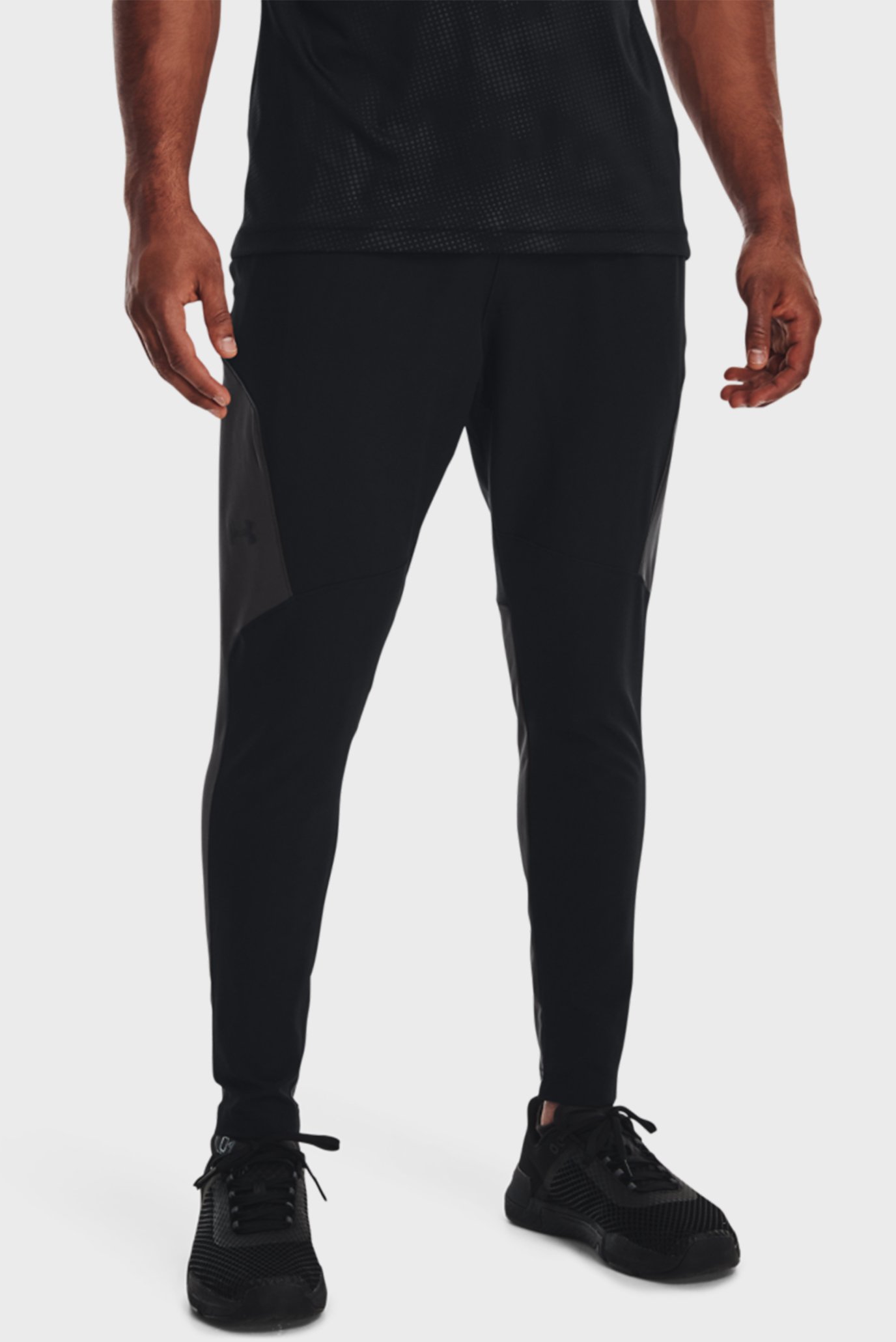 Чоловічі чорні спортивні штани UA Unstoppable Hybrid Pant 1