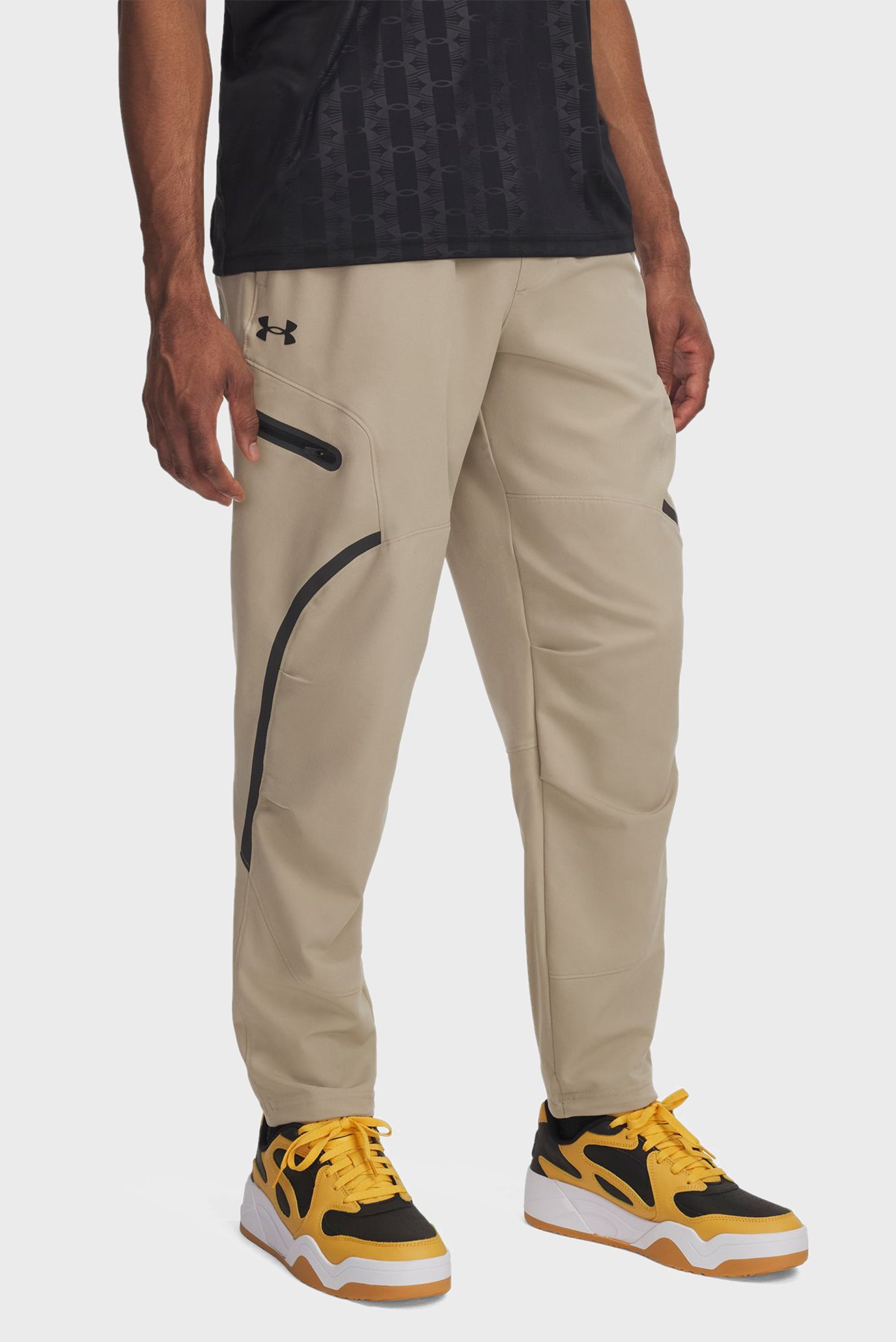 Чоловічі бежеві спортивні штани UA Unstoppable Cargo Pant 1