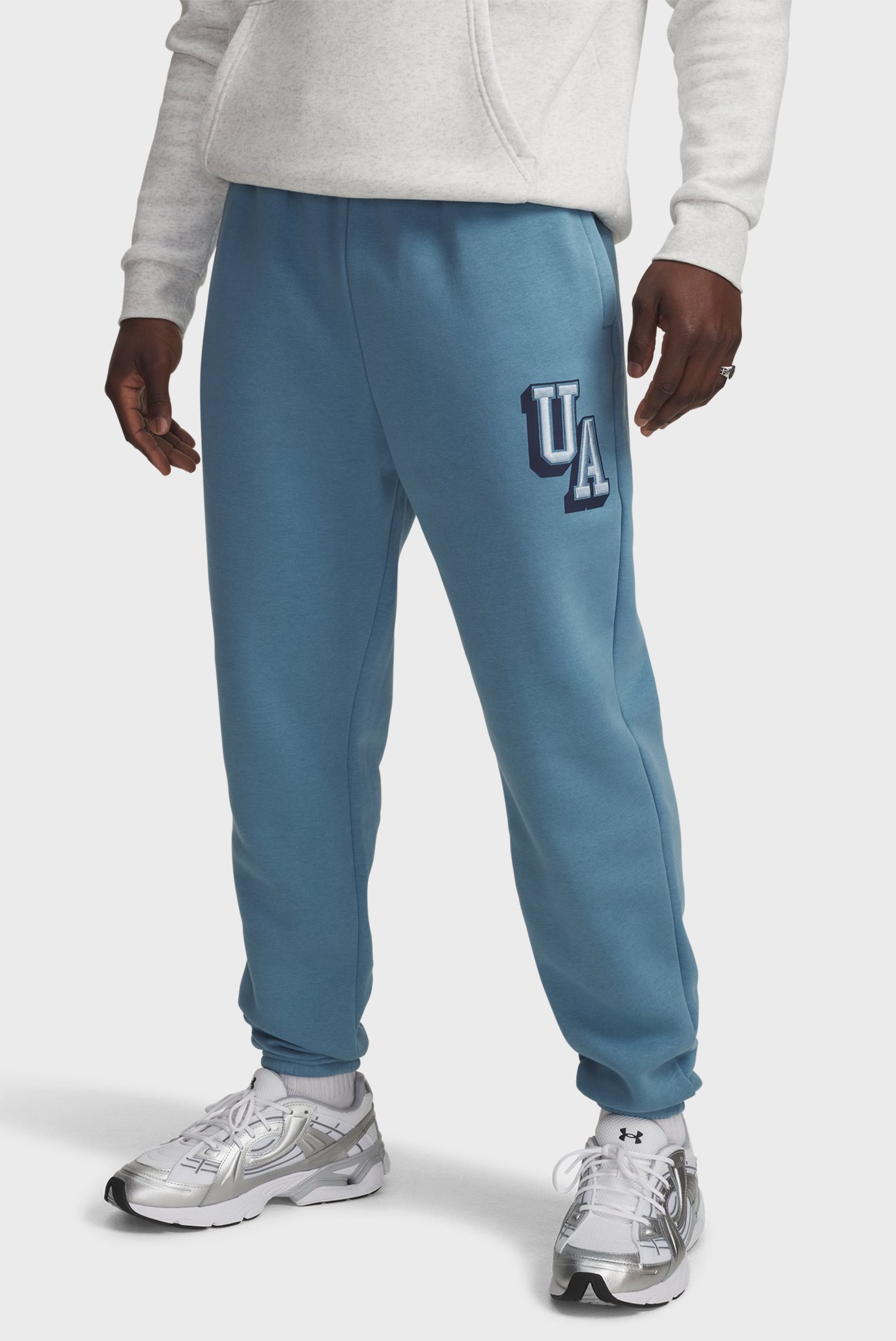 Мужские голубые спортивные брюки UA Icon Flc Graphic Jgr Голубой XL Under Armour 6003934-418 Мужские голубые спортивные брюки UA Icon Flc Graphic Jgr Голубой XL Under Armour 6003934-418