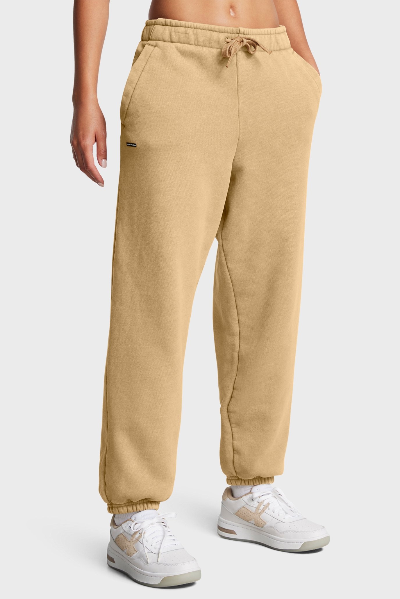 Женские бежевые спортивные брюки UA Icon HWT Flc OS Pant 1