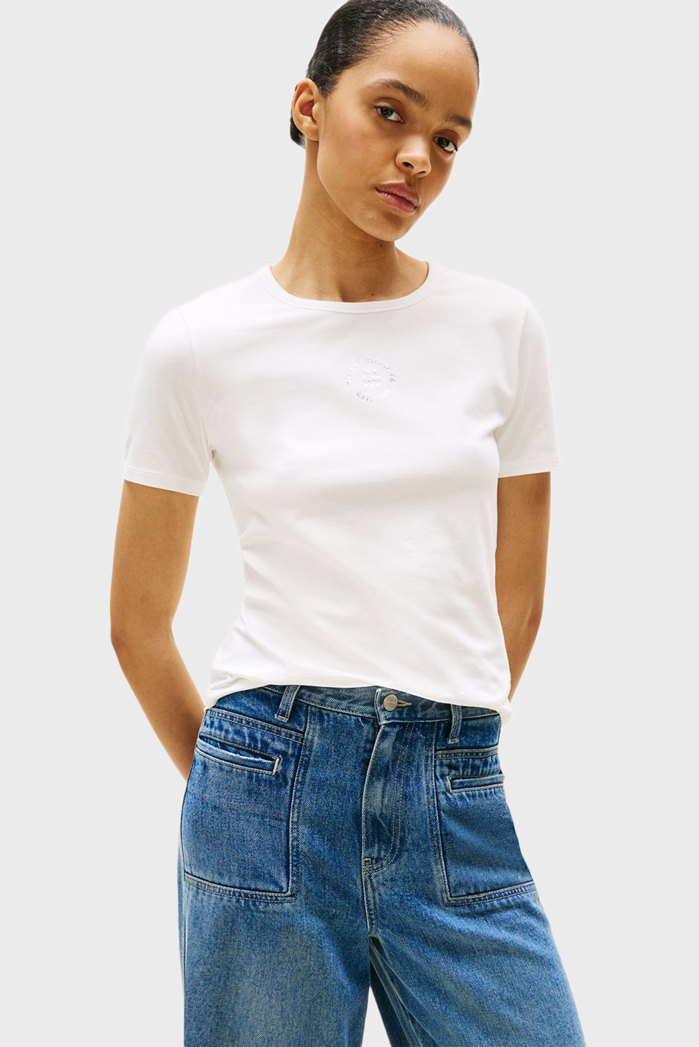 Женская белая футболка STAMP LOGO SLIM Белый L Tommy Hilfiger WW0WW45809 Женская белая футболка STAMP LOGO SLIM Белый L Tommy Hilfiger WW0WW45809