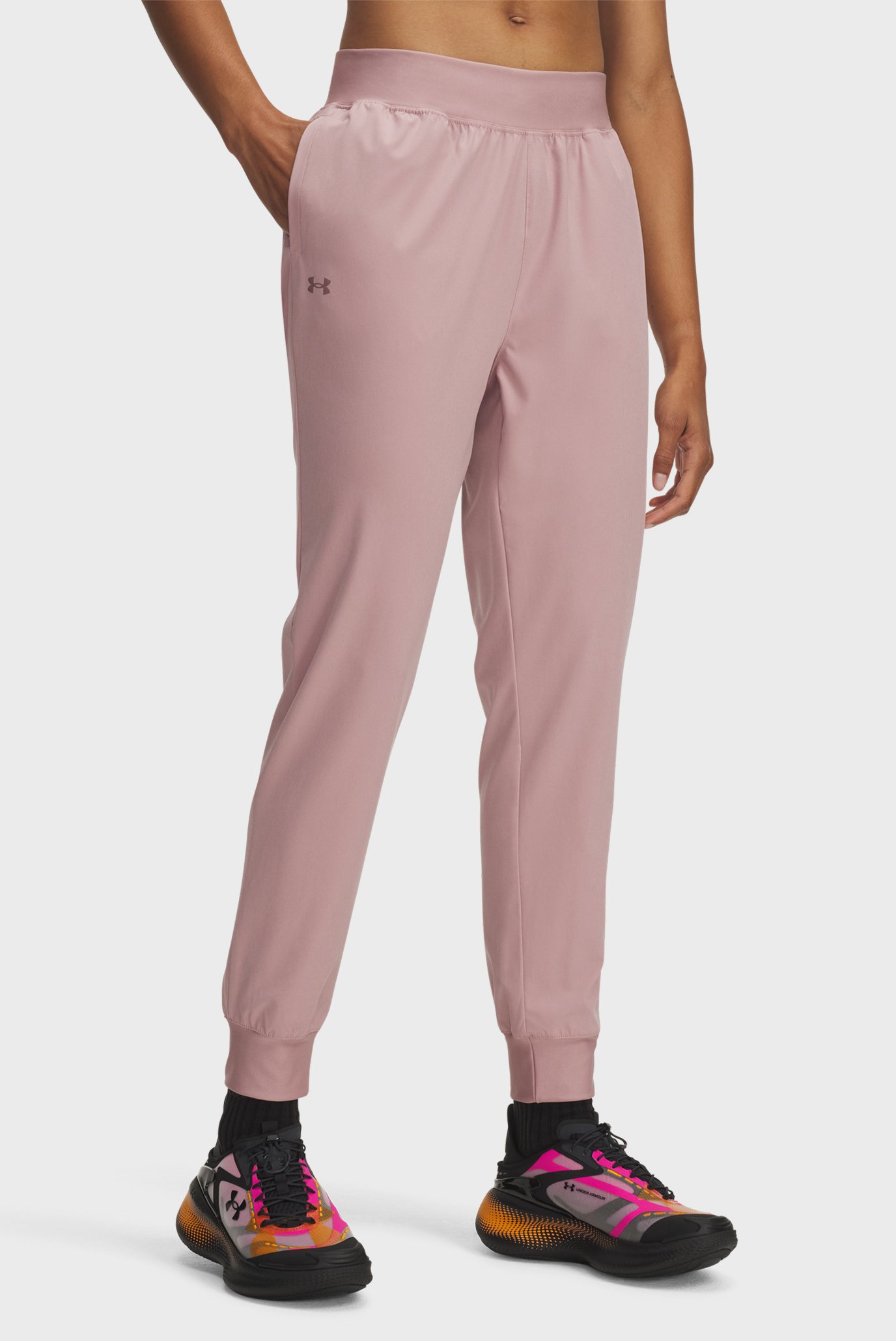 Женские пудровые спортивные брюки UA Rival Hi Rise Woven Pant Розовый L Under Armour 1382727-673 Женские пудровые спортивные брюки UA Rival Hi Rise Woven Pant Розовый L Under Armour 1382727-673