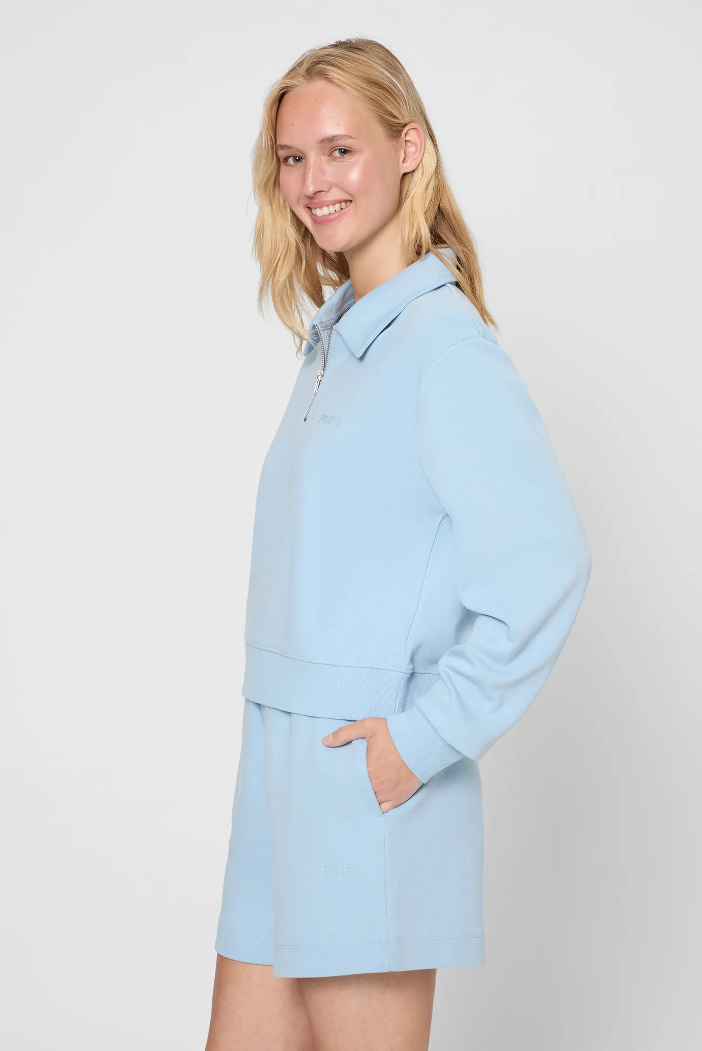 Жіноче блакитне поло 3