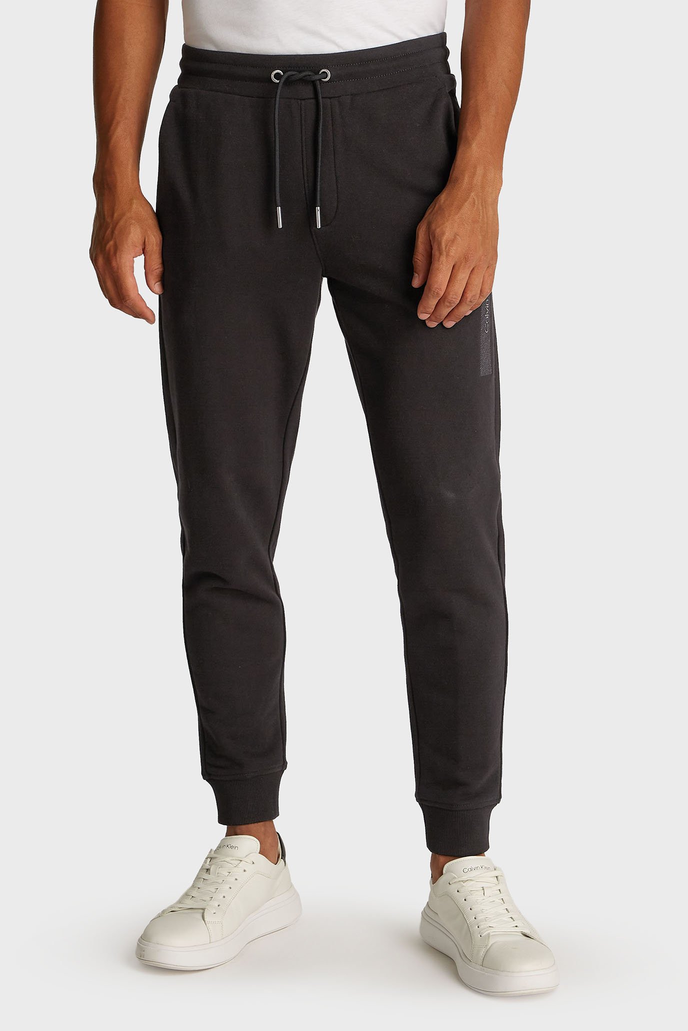 Мужские черные спортивные брюки STRUCTURED EMBROIDERY Черный L Calvin Klein K10K113838 Мужские черные спортивные брюки STRUCTURED EMBROIDERY Черный L Calvin Klein K10K113838