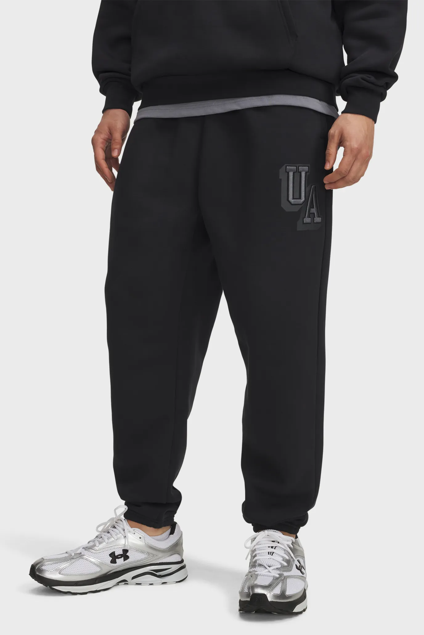 Чоловічі чорні спортивні штани UA Icon Flc Graphic Jgr 1