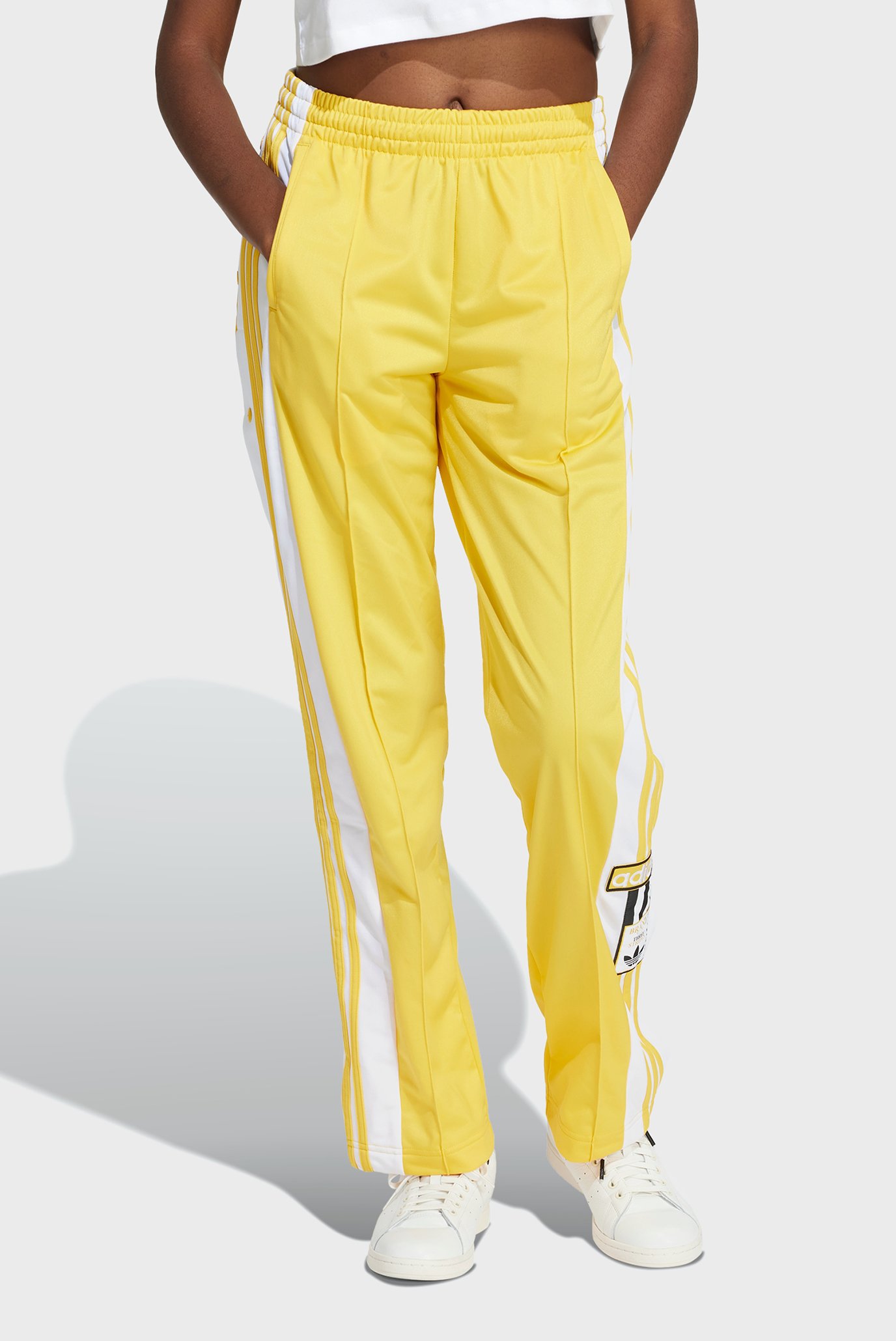 Женские желтые спортивные брюки Adibreak 1