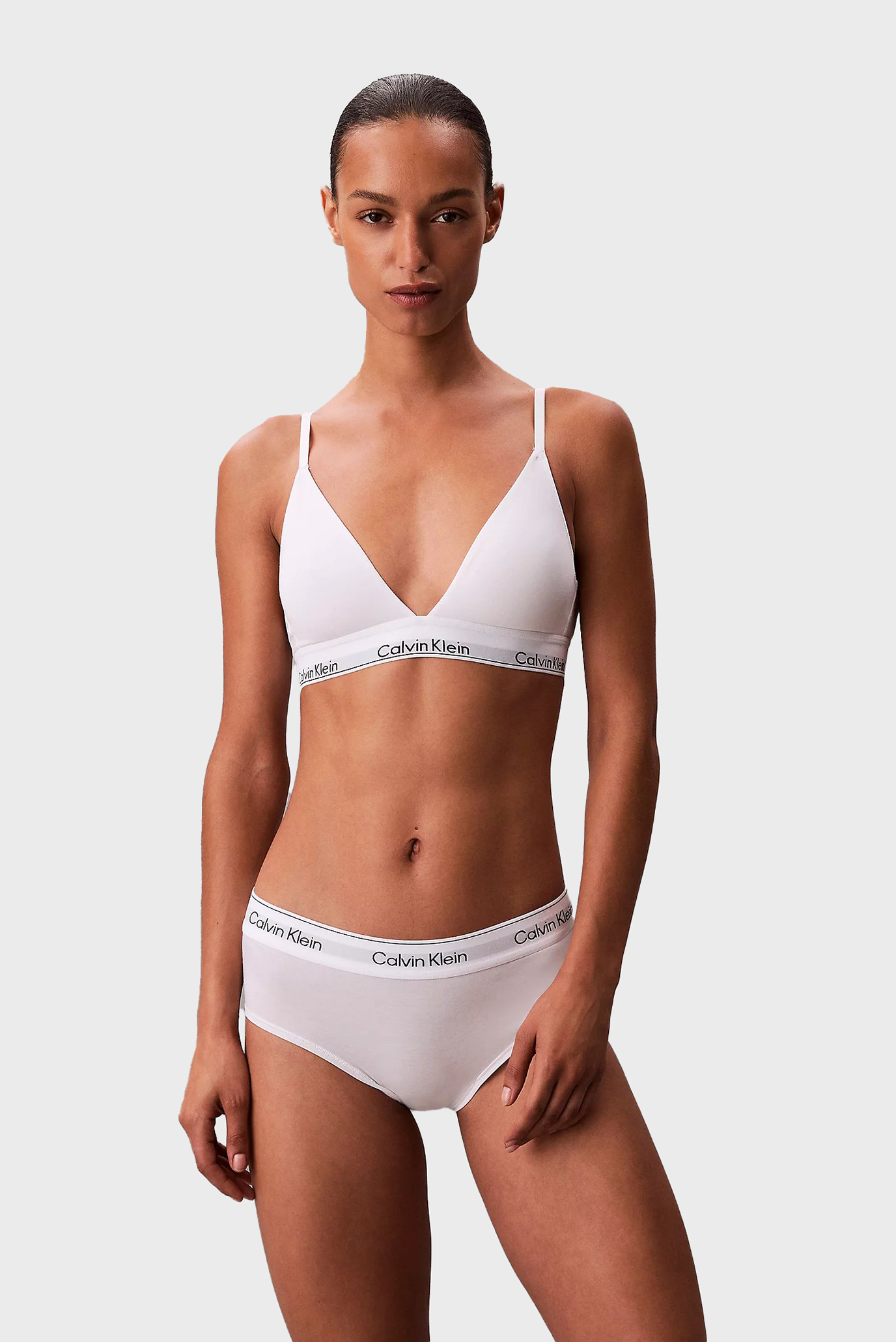 Женский белый бюстгальтер LIGHTLY LINED TRIANGLE Белый L Calvin Klein LV00QF8498 Женский белый бюстгальтер LIGHTLY LINED TRIANGLE Белый L Calvin Klein LV00QF8498
