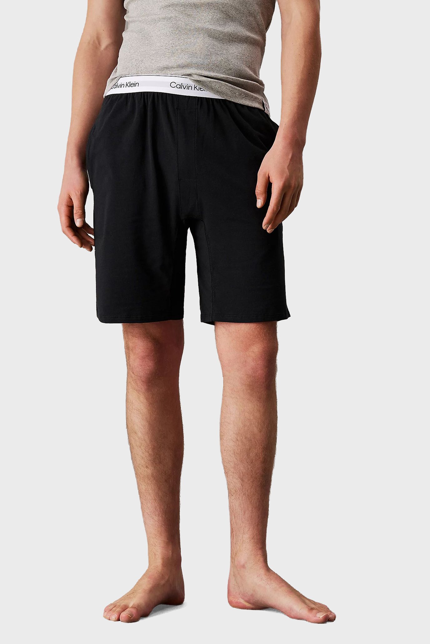Мужские черные шорты SLEEP SHORT Черный XL Calvin Klein 000NM2847E Мужские черные шорты SLEEP SHORT Черный XL Calvin Klein 000NM2847E