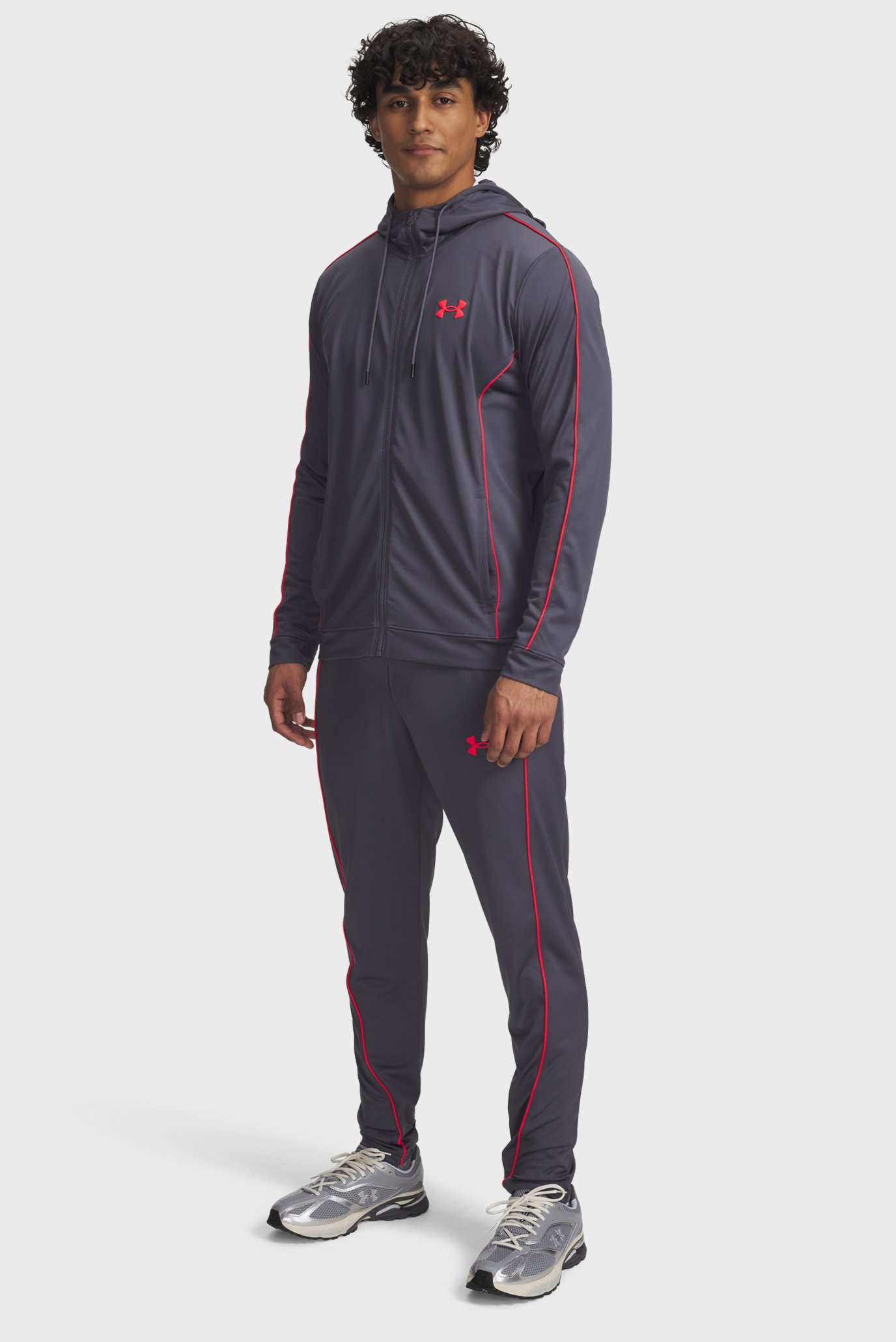 Мужской темно-серый спортивный костюм (худи, брюки) UA EMEA Tracksuit Novelty Серый 3XL Under Armour 1390152-025 Мужской темно-серый спортивный костюм (худи, брюки) UA EMEA Tracksuit Novelty Серый 3XL Under Armour 1390152-025