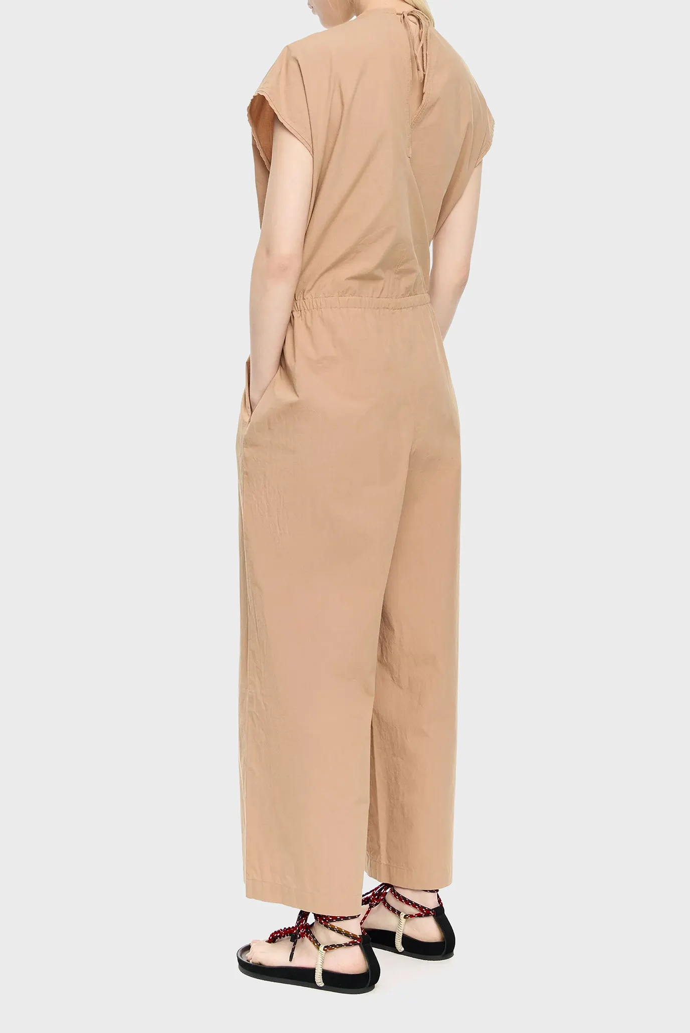 Жіночий бежевий комбінезон 2