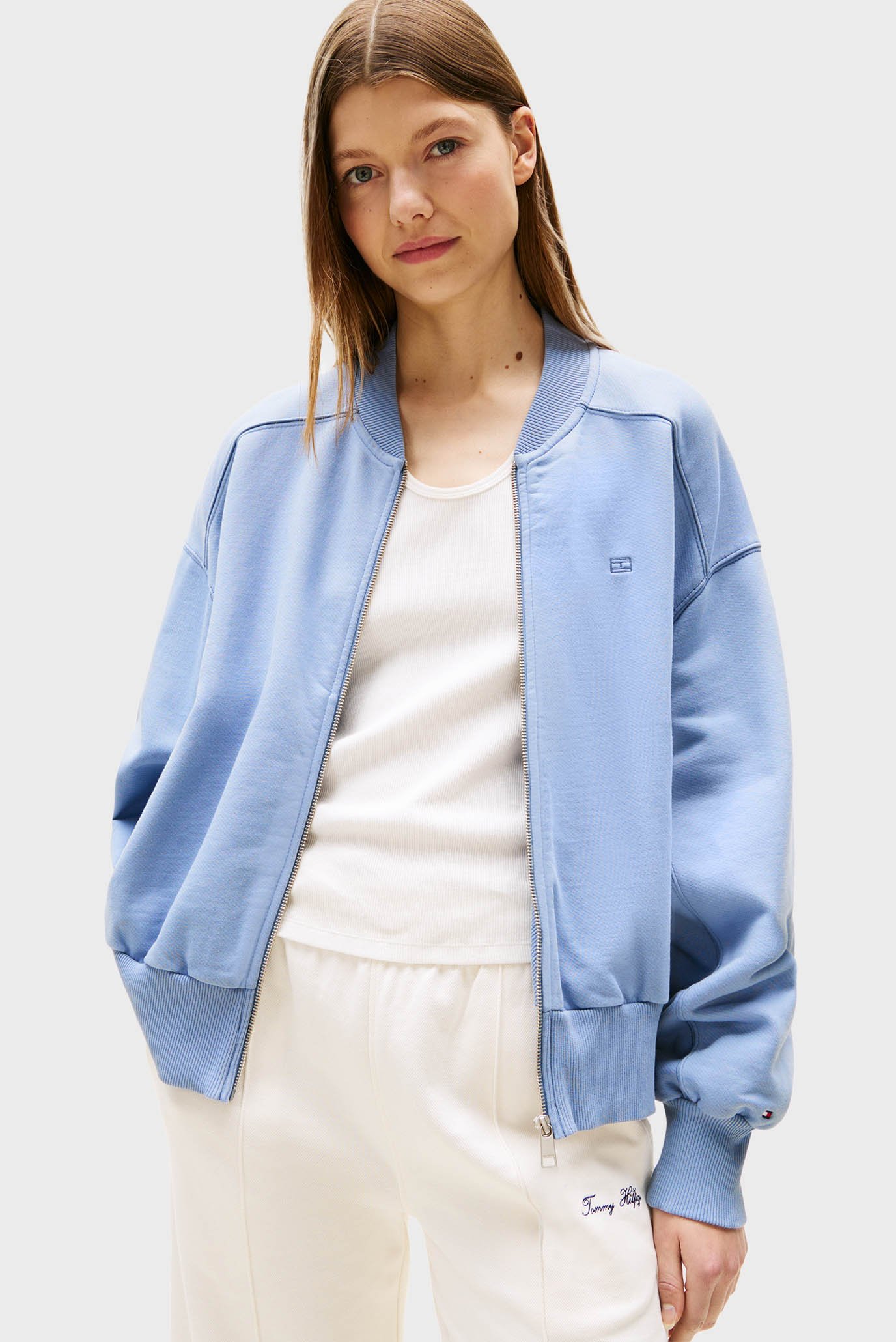 Женский голубой бомбер TONAL FLAG TERRY ZIP-UP Голубой S Tommy Hilfiger WW0WW45753 Женский голубой бомбер TONAL FLAG TERRY ZIP-UP Голубой S Tommy Hilfiger WW0WW45753