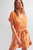Женские оранжевые шорты с принтом