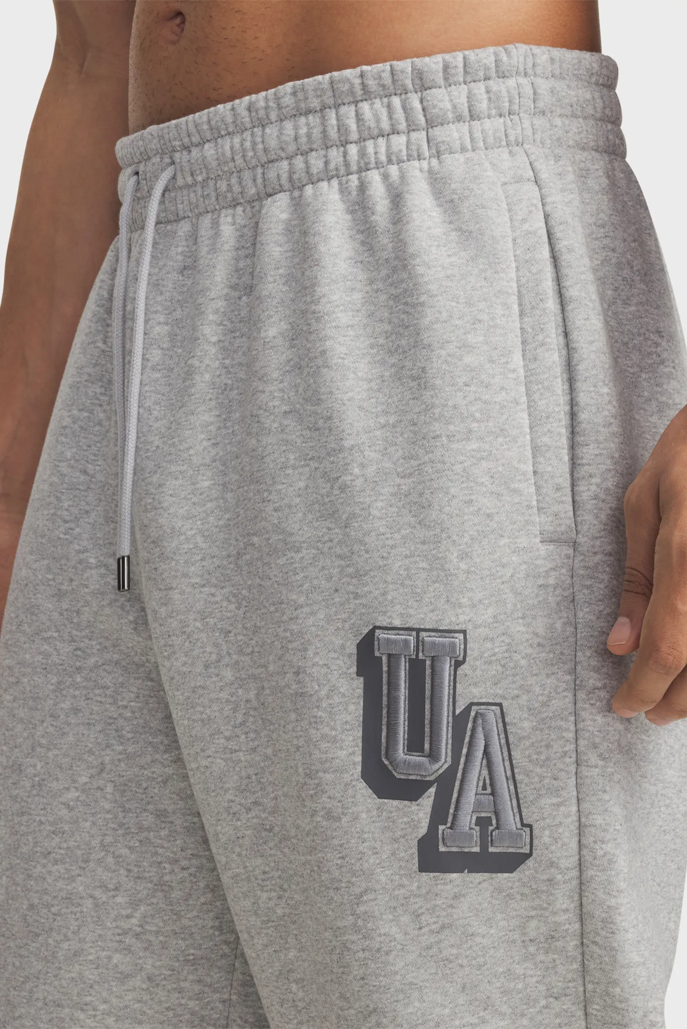 Чоловічі сірі спортивні штани UA Icon Flc Graphic Jgr 4