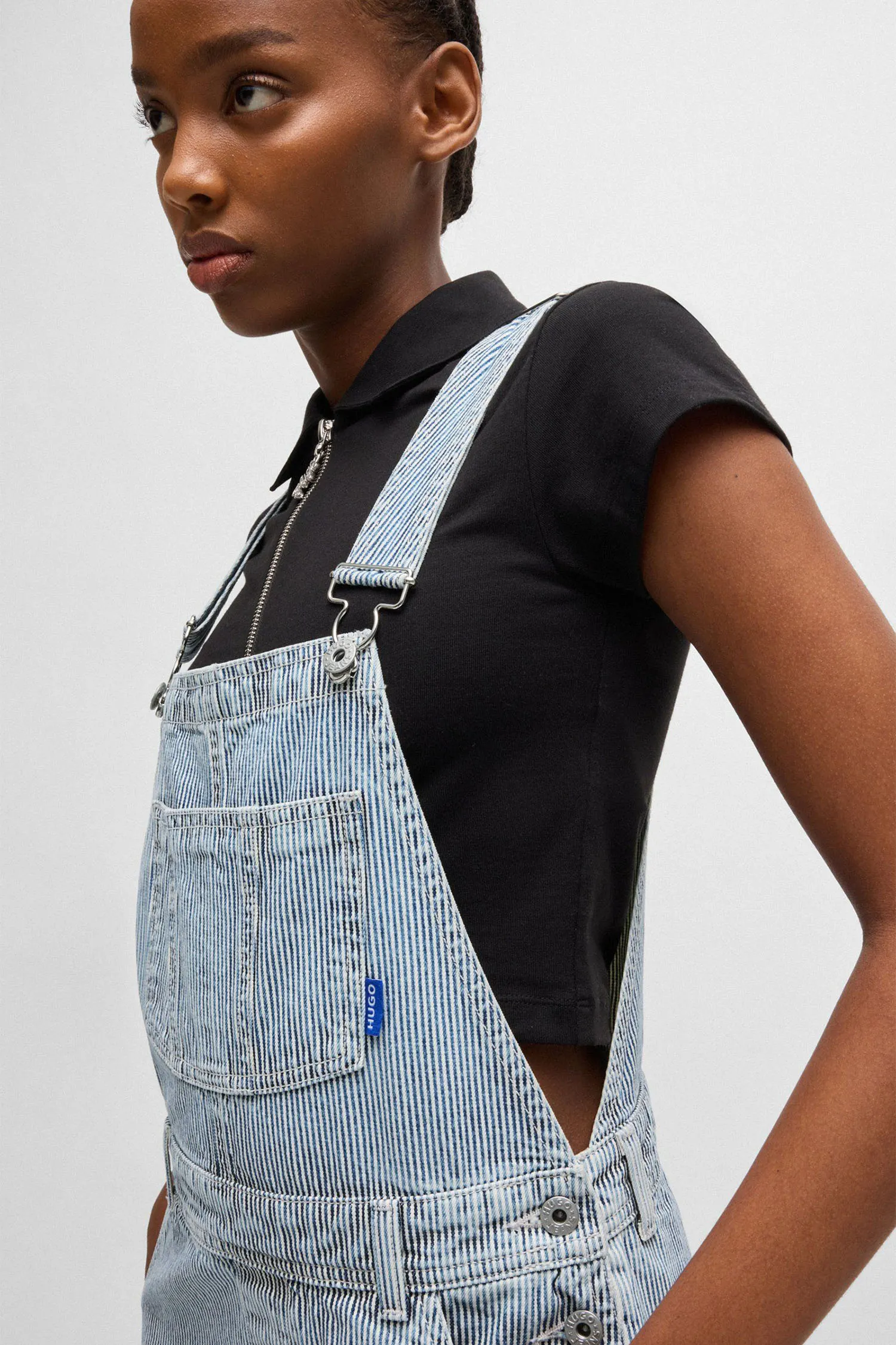 Жіночий блакитний джинсовий комбінезон у смужку 4