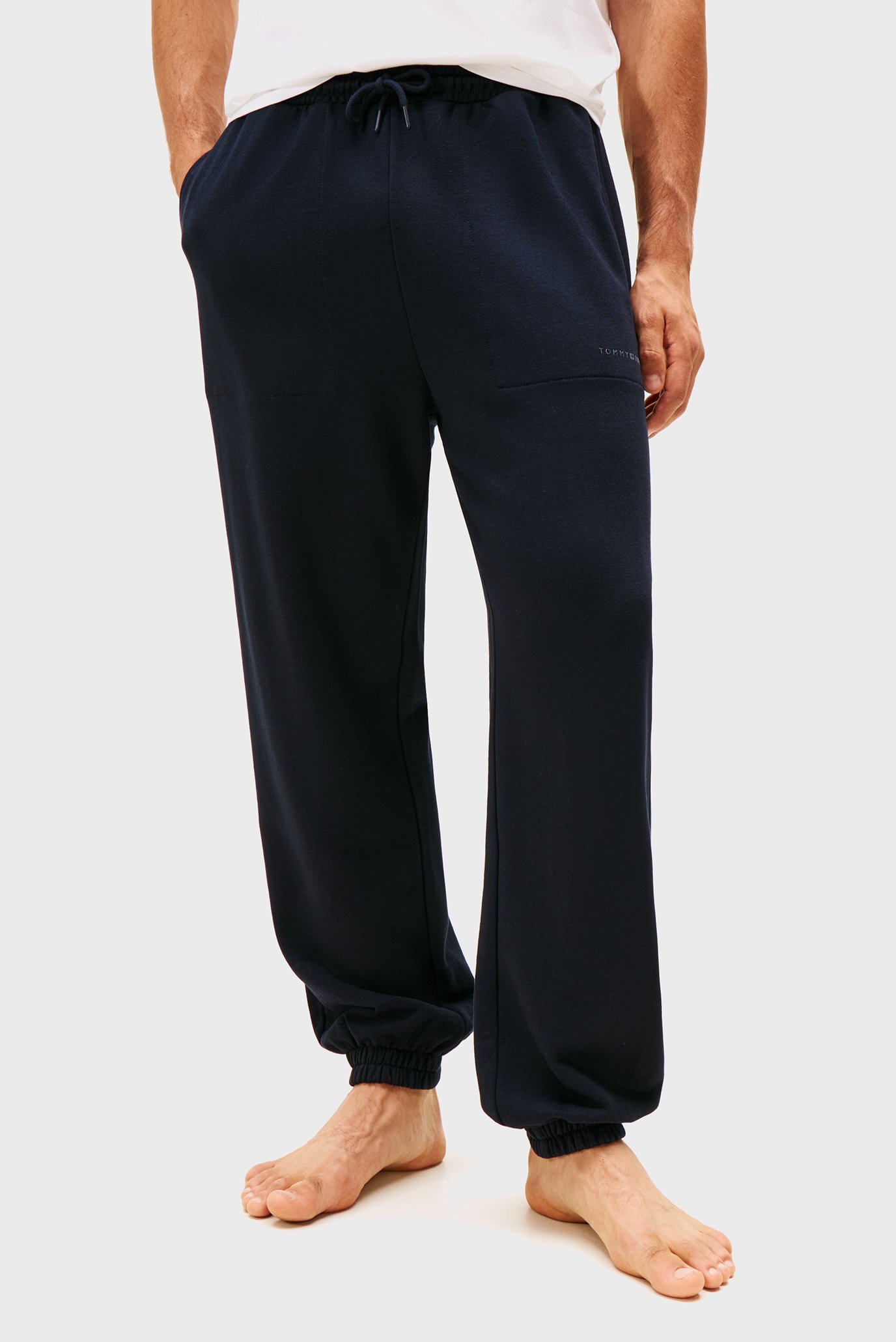 Мужские темно-синие брюки TRACK PANT Синий S Tommy Hilfiger UM0UM03627 Мужские темно-синие брюки TRACK PANT Синий S Tommy Hilfiger UM0UM03627