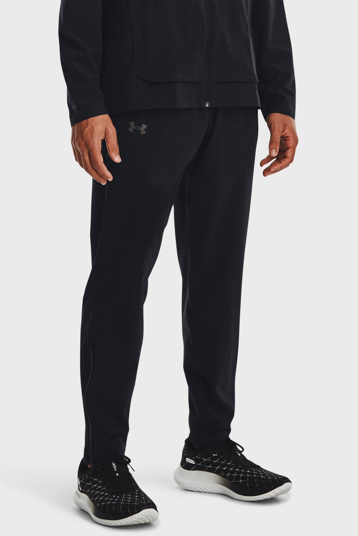 Мужские черные спортивные брюки UA OUTRUN THE STORM PANT 1