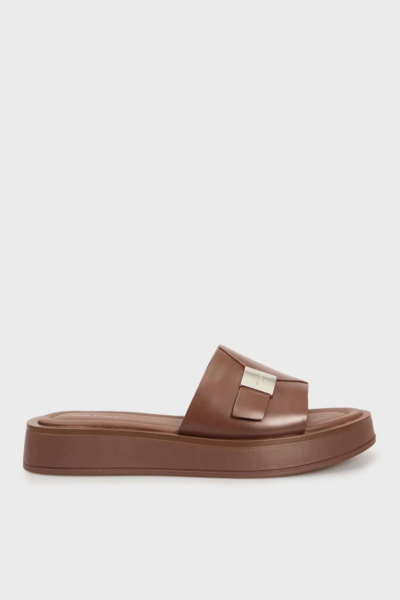 Женские коричневые кожаные слайдеры FLATFORM SLIDE W/CK HW - LTH Коричневый 38 Calvin Klein HW0HW02368