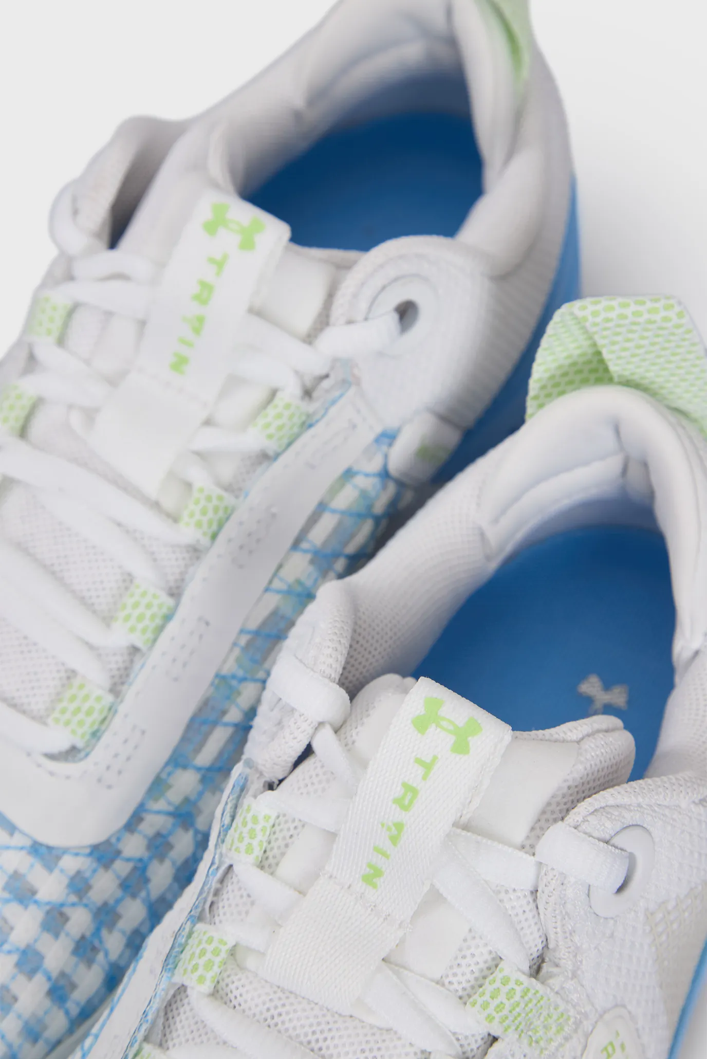 Жіночі білі кросівки UA W TriBase Reign 6 2