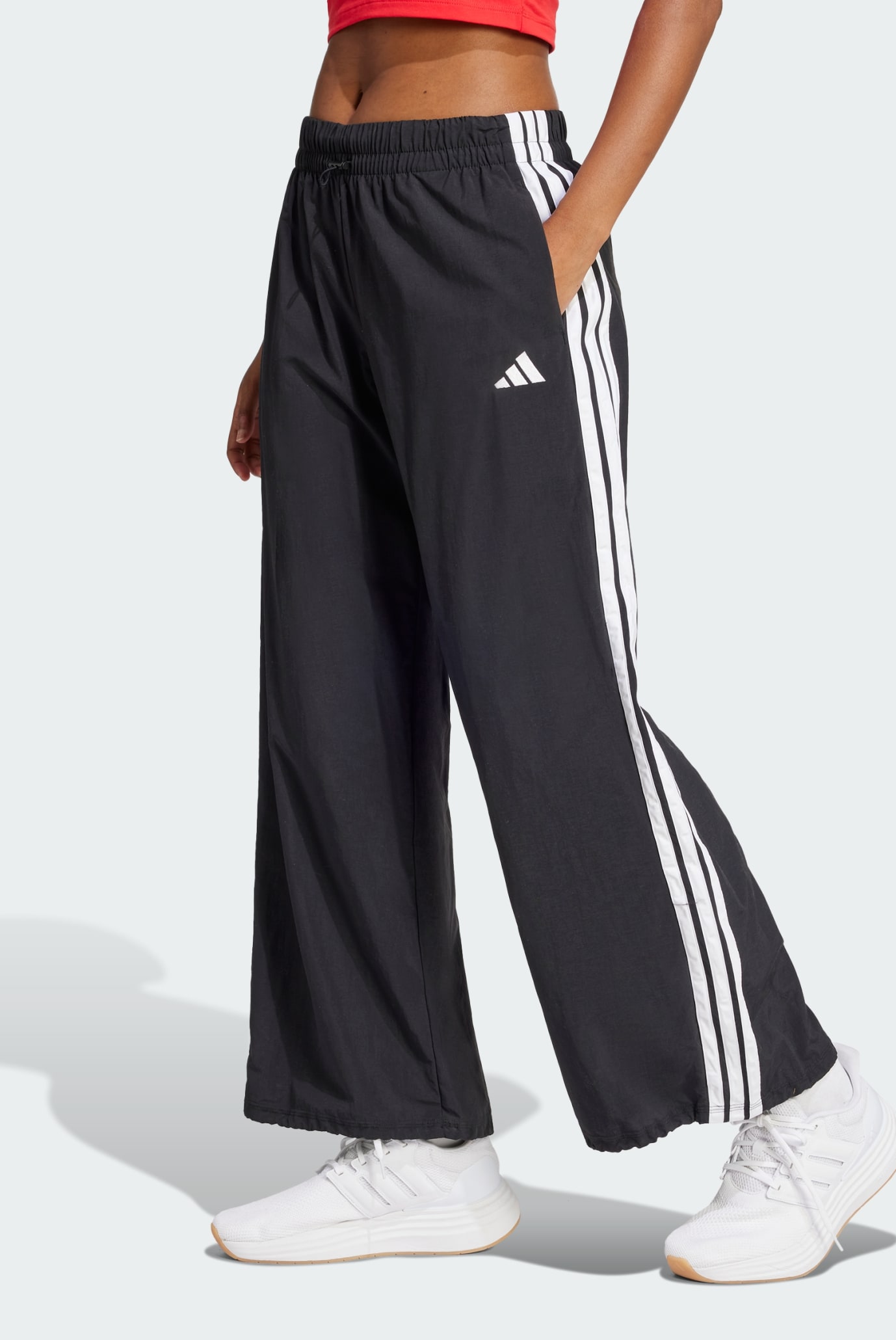 Женские черные спортивные брюки Essentials 3-Stripes Lifestyle Woven Parachute 1