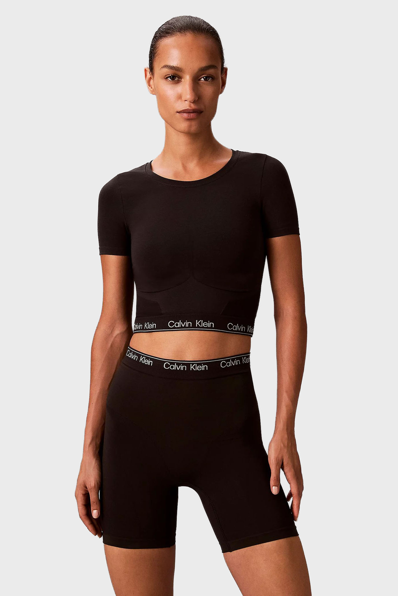 Женский черный топ SHORT SLEEVE Черный XL Calvin Klein LV00QF8342 Женский черный топ SHORT SLEEVE Черный XL Calvin Klein LV00QF8342
