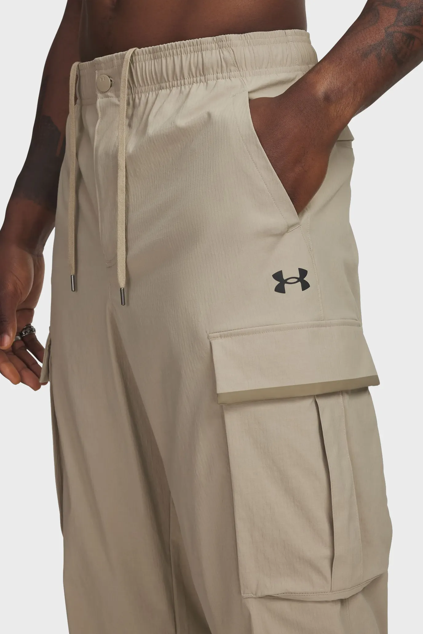 Чоловічі бежеві спортивні штани UA UNSTPBLE TXTR WOVEN CARGO 4