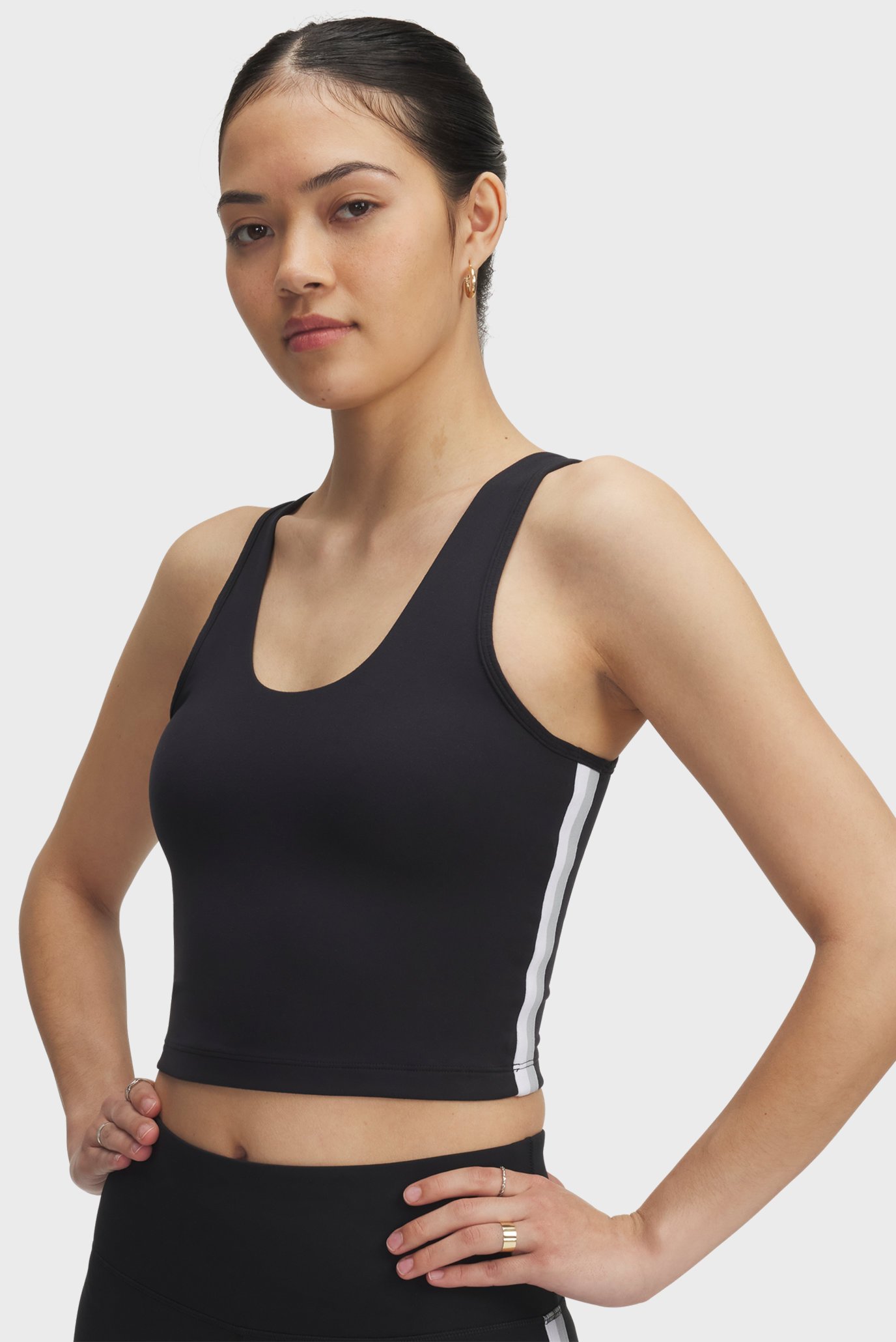 Женский черный топ UA Motion Sport Tape Tank Черный M Under Armour 6005844-006 Женский черный топ UA Motion Sport Tape Tank Черный M Under Armour 6005844-006