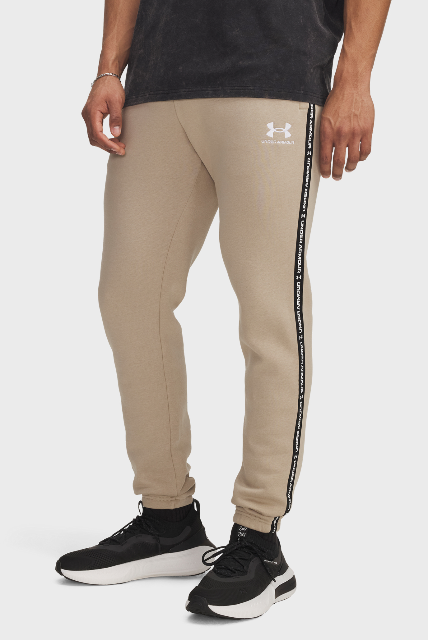 Мужские бежевые спортивные брюки UA Icon Fleece Jgr Taping Бежевый 3XL Under Armour 1389358-299 Мужские бежевые спортивные брюки UA Icon Fleece Jgr Taping Бежевый 3XL Under Armour 1389358-299