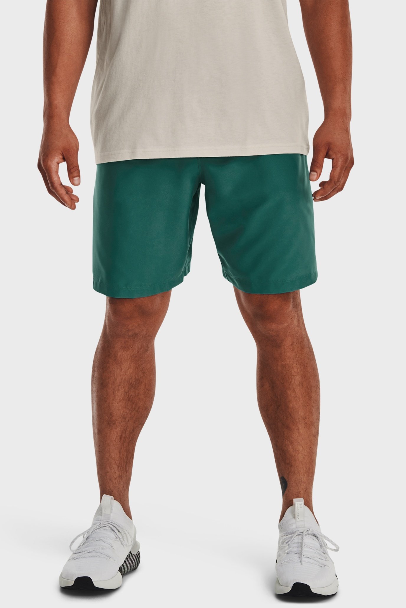 Чоловічі зелені шорти UA Woven Graphic Shorts 1