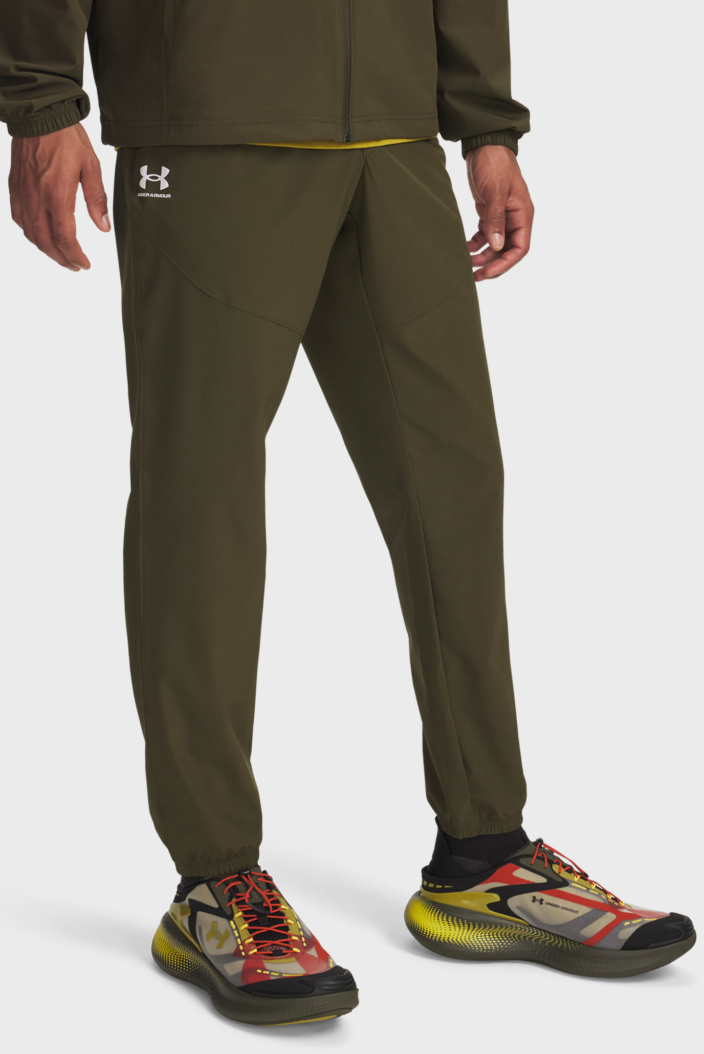 Мужские темно-зеленые спортивные брюки UA Vibe Woven Jogger Зеленый XXL Under Armour 1386557-308 Мужские темно-зеленые спортивные брюки UA Vibe Woven Jogger Зеленый XXL Under Armour 1386557-308