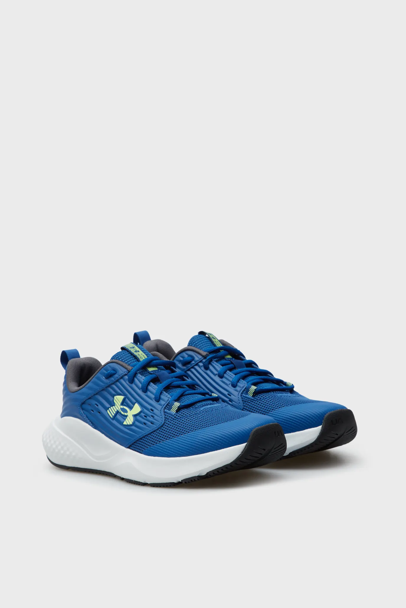 Чоловічі сині шкіряні кросівки UA Charged Commit TR 4 3