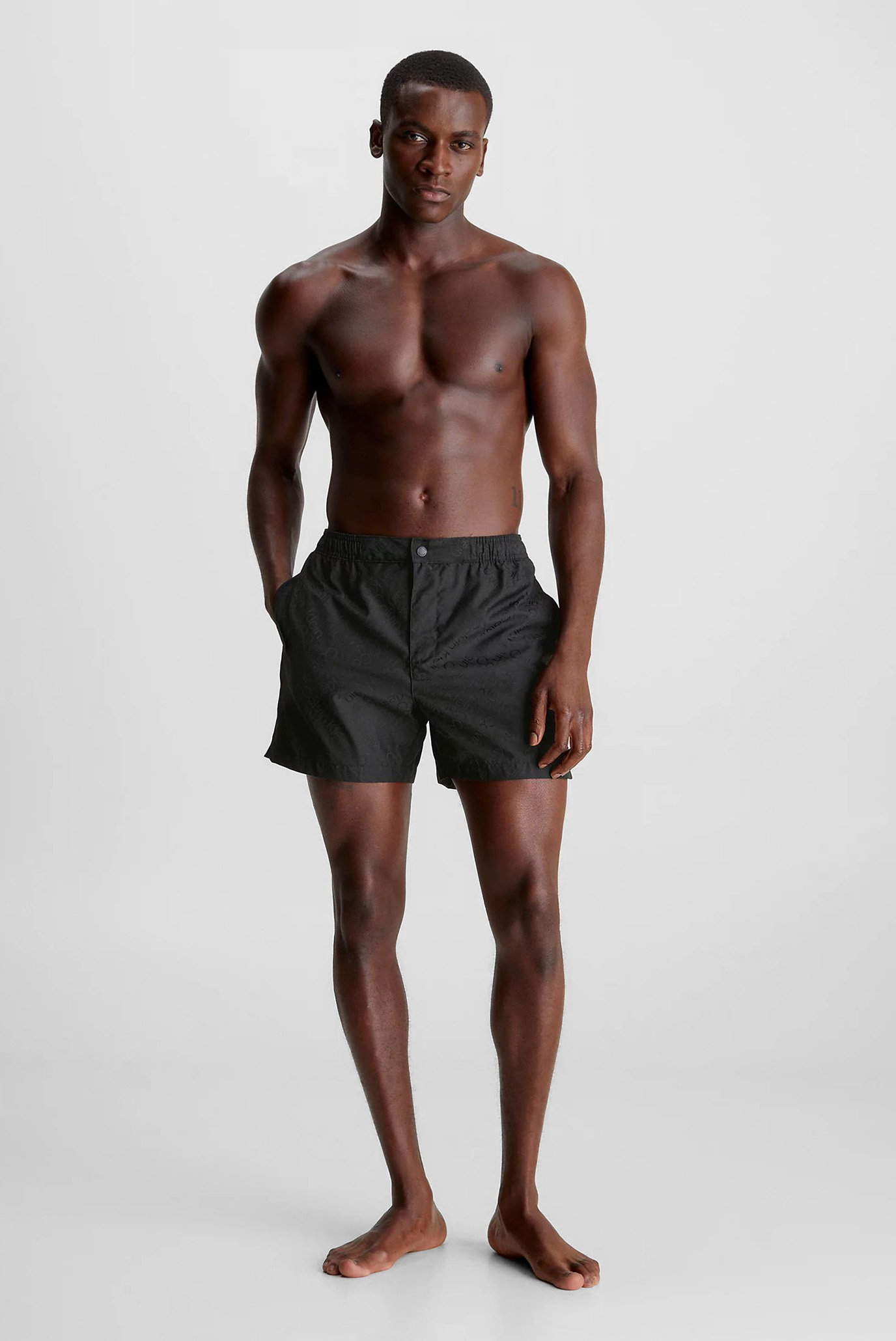 Мужские черные плавательные шорты с узором MEDIUM TAILORED Черный S Calvin Klein KM0KM00943 Мужские черные плавательные шорты с узором MEDIUM TAILORED Черный S Calvin Klein KM0KM00943