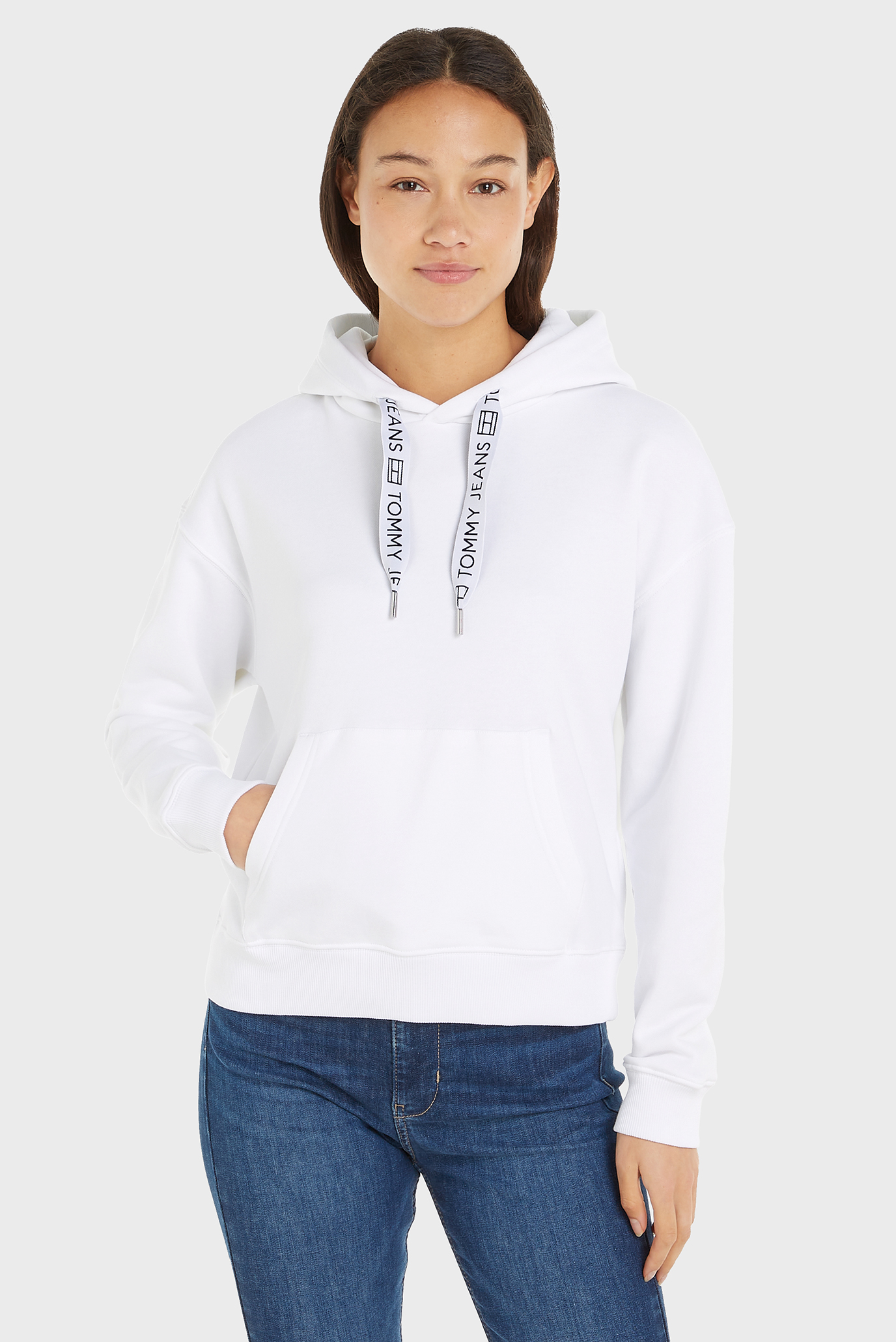 Женское белое худи TJW BXY LOGO DRAWCORD HOODIE EXT Белый XS Tommy Jeans DW0DW17794 Женское белое худи TJW BXY LOGO DRAWCORD HOODIE EXT Белый XS Tommy Jeans DW0DW17794