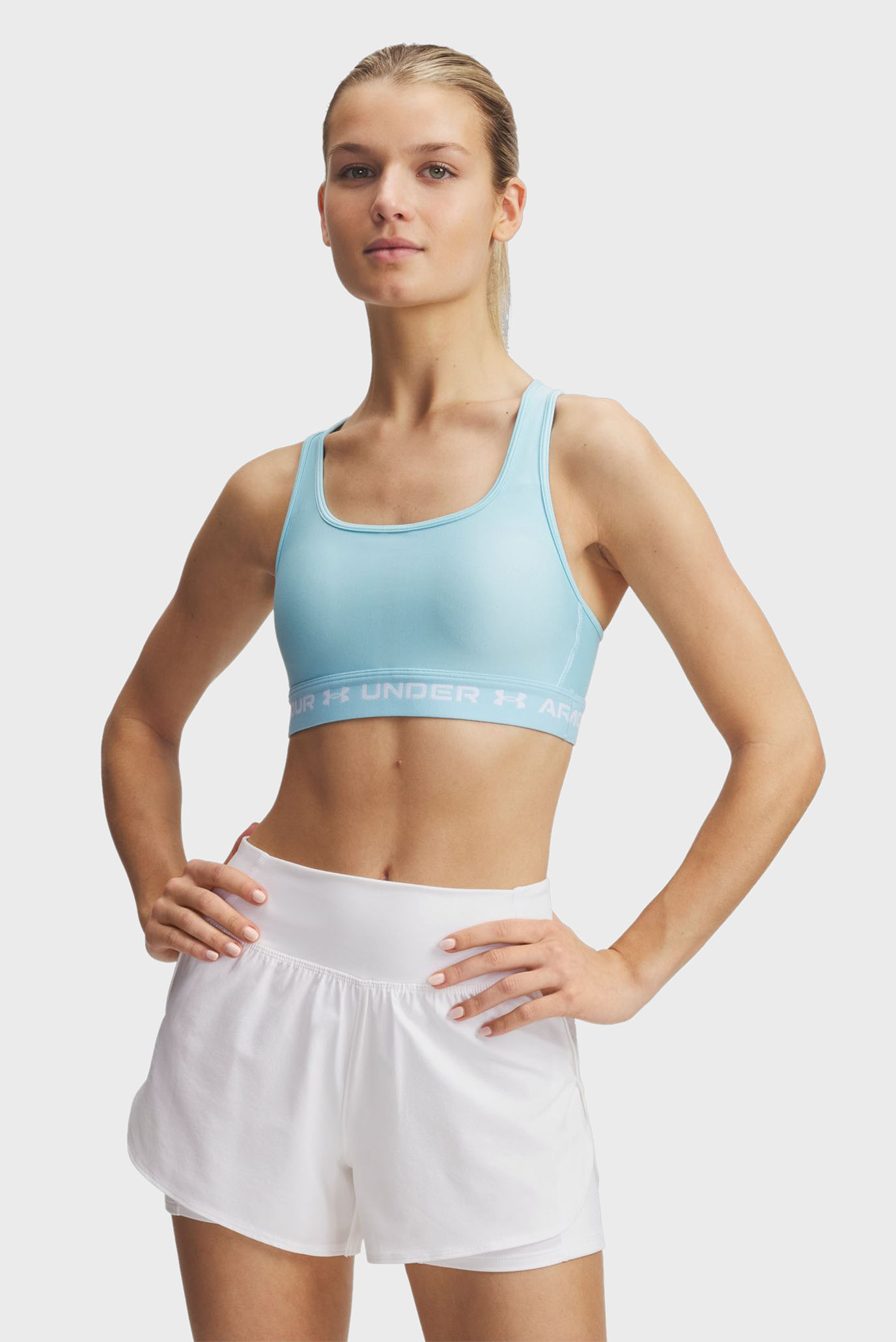 Женский голубой топ Crossback Mid Bra Голубой L Under Armour 1361034-494 Женский голубой топ Crossback Mid Bra Голубой L Under Armour 1361034-494