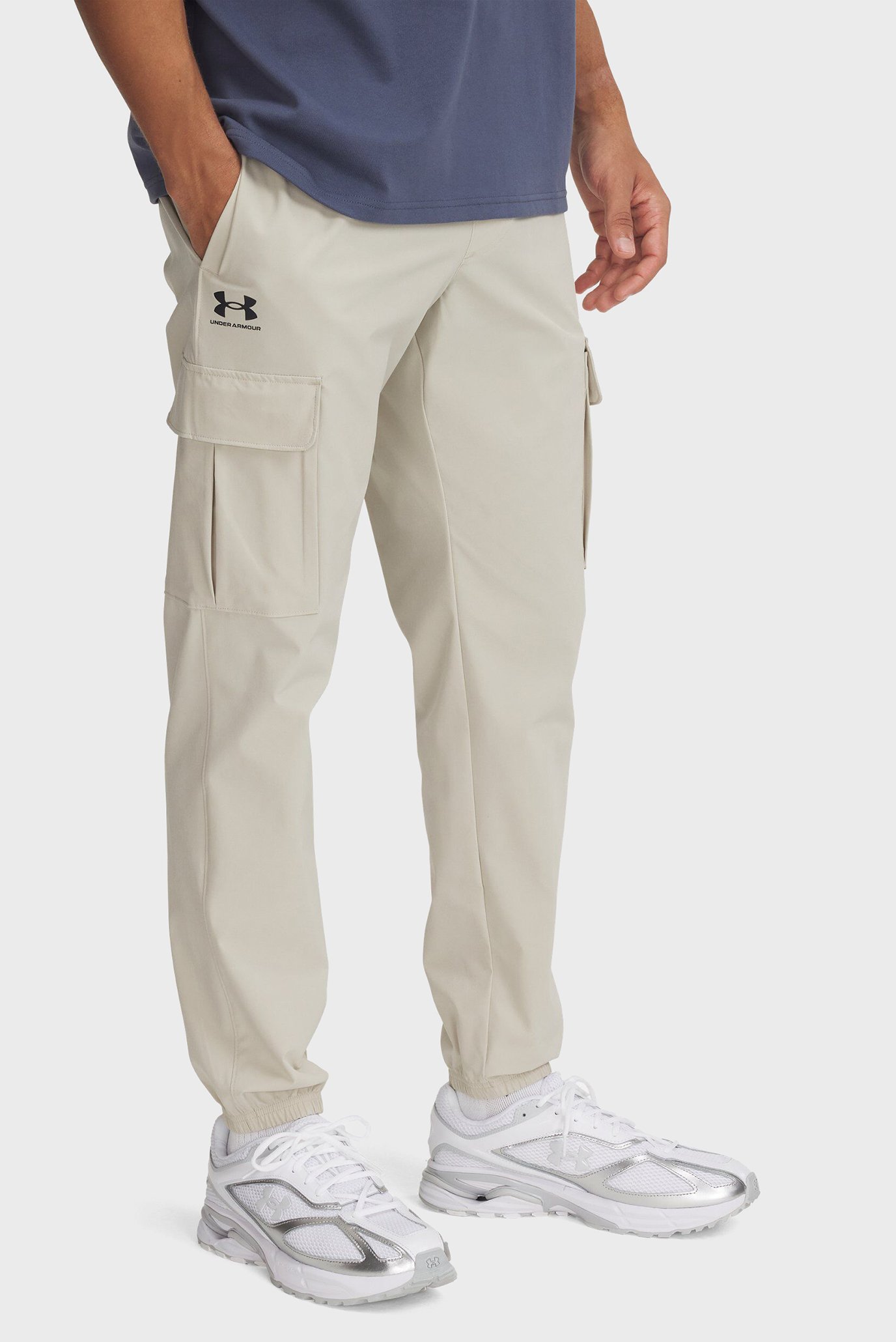Мужские бежевые спортивные брюки UA Vibe Woven Cargo Pants Бежевый L Under Armour 1386558-289 Мужские бежевые спортивные брюки UA Vibe Woven Cargo Pants Бежевый L Under Armour 1386558-289
