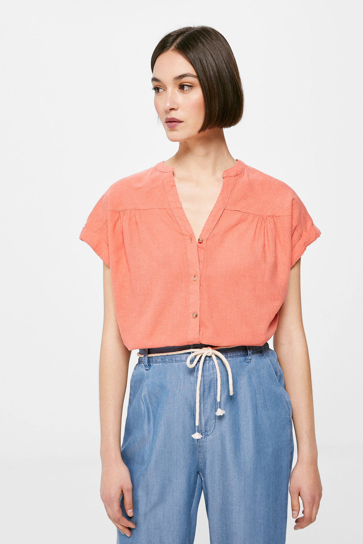 Женская персиковая блуза 1