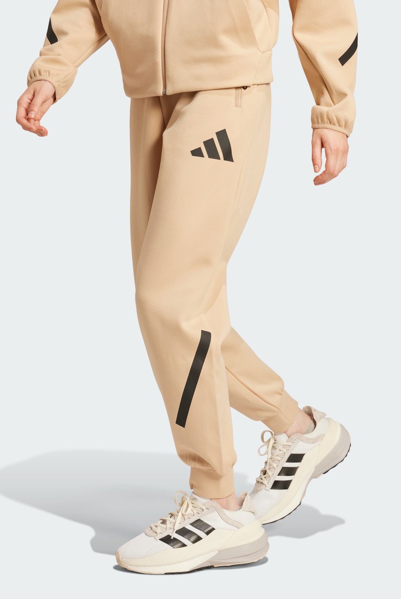 Женские бежевые спортивные брюки adidas Z.N.E. 1