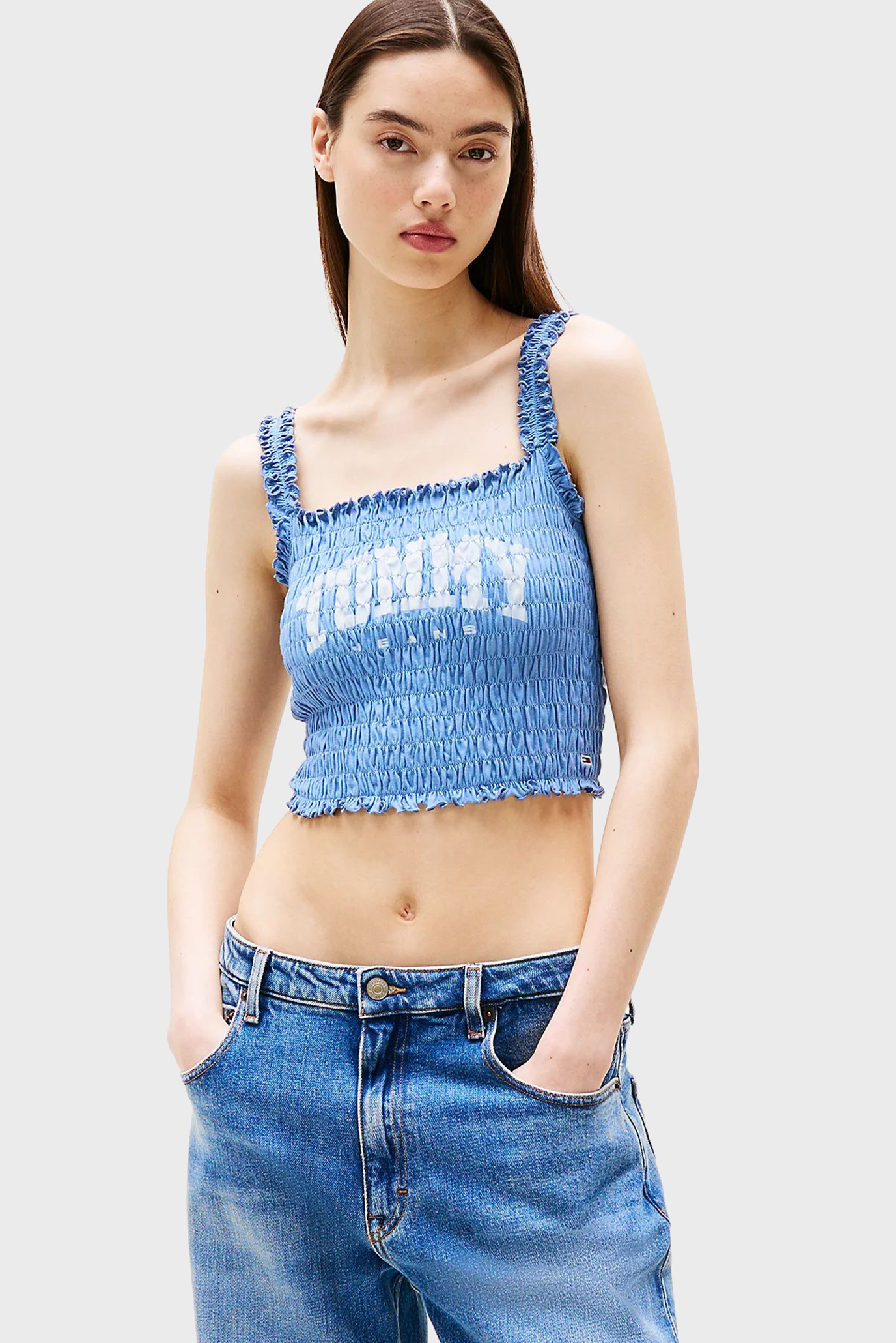Женский голубой топ SMOCK VARSITY BRALETTE Голубой S Tommy Jeans DW0DW20240 Женский голубой топ SMOCK VARSITY BRALETTE Голубой S Tommy Jeans DW0DW20240