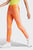 Жіночі помаранчеві тайтси Trefoil Monogram SST