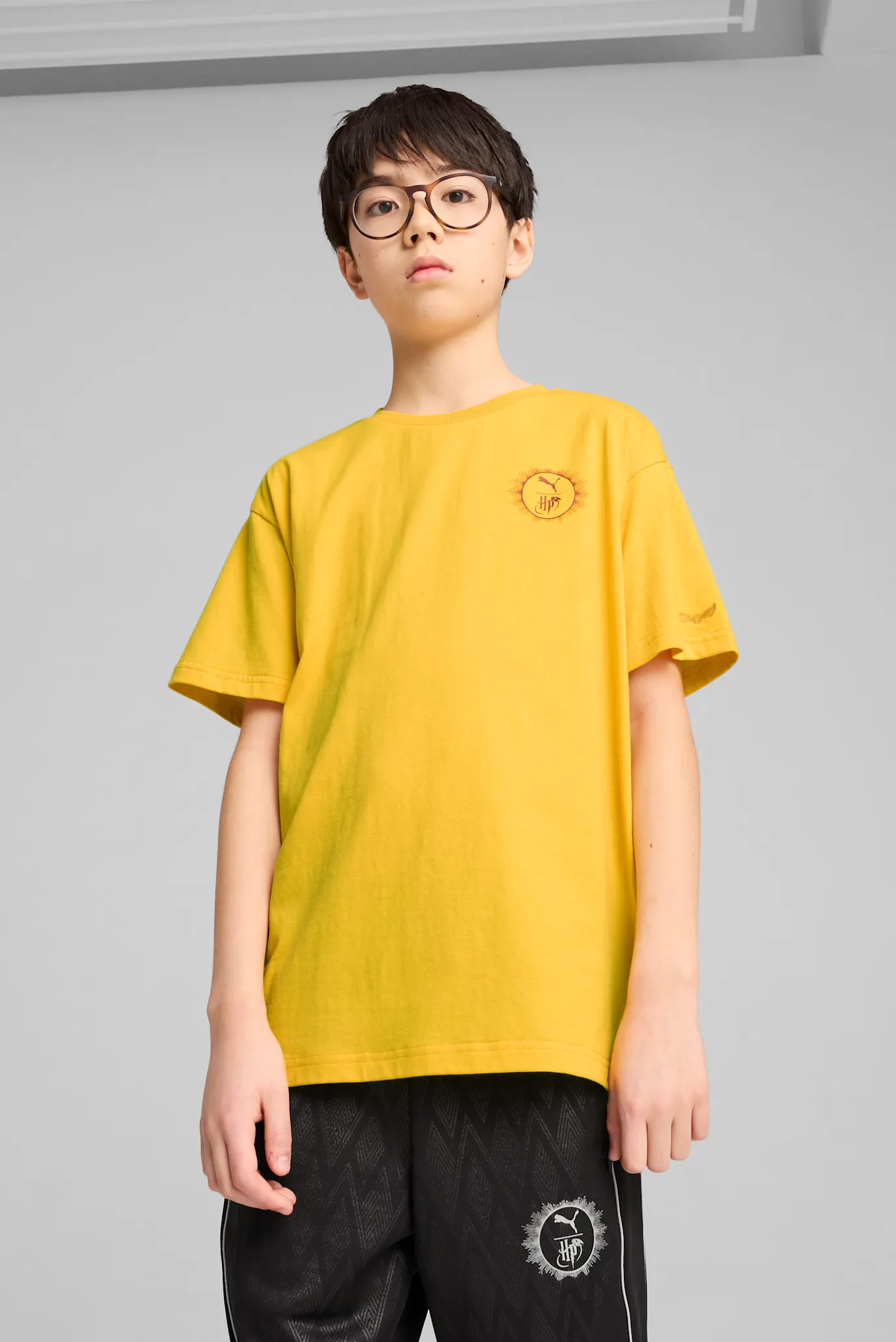 Детская желтая футболка PUMA x HARRY POTTER Relaxed Graphic Tee Men 1