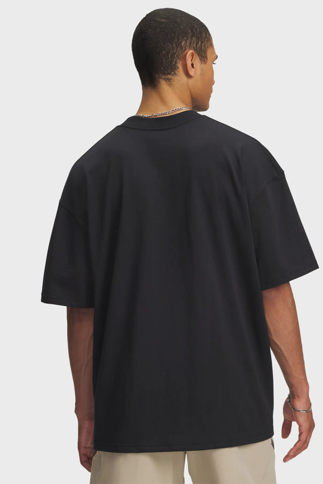 Чоловіча чорна футболка UA HWT WOVEN LABEL SS 2