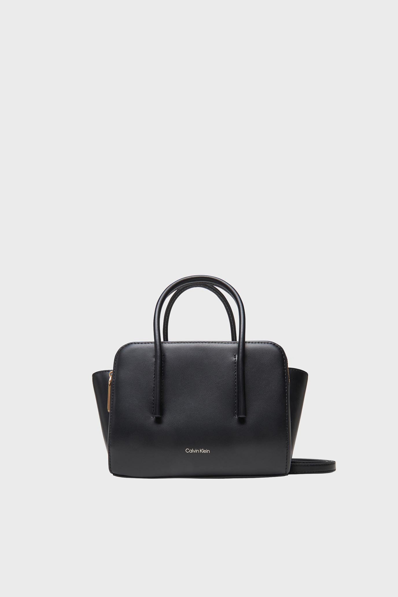 Женская черная кожаная сумка CARRYALL MICRO Черный ONESIZE Calvin Klein LV04F3057G Женская черная кожаная сумка CARRYALL MICRO Черный ONESIZE Calvin Klein LV04F3057G
