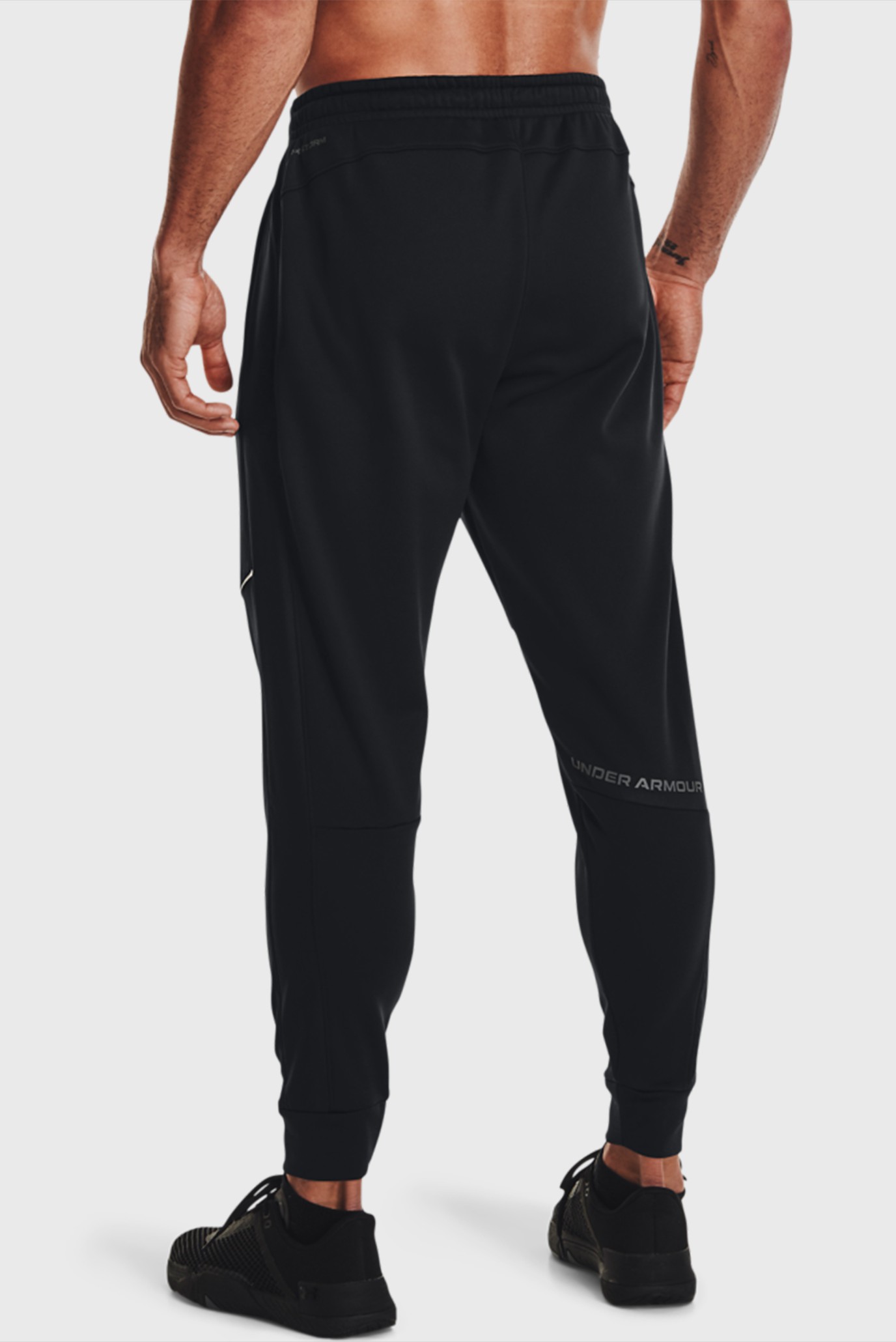 Men's ua storm pants best sale