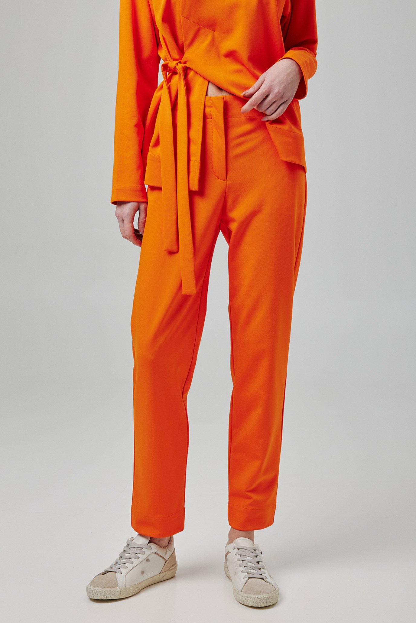 Женские оранжевые брюки 1