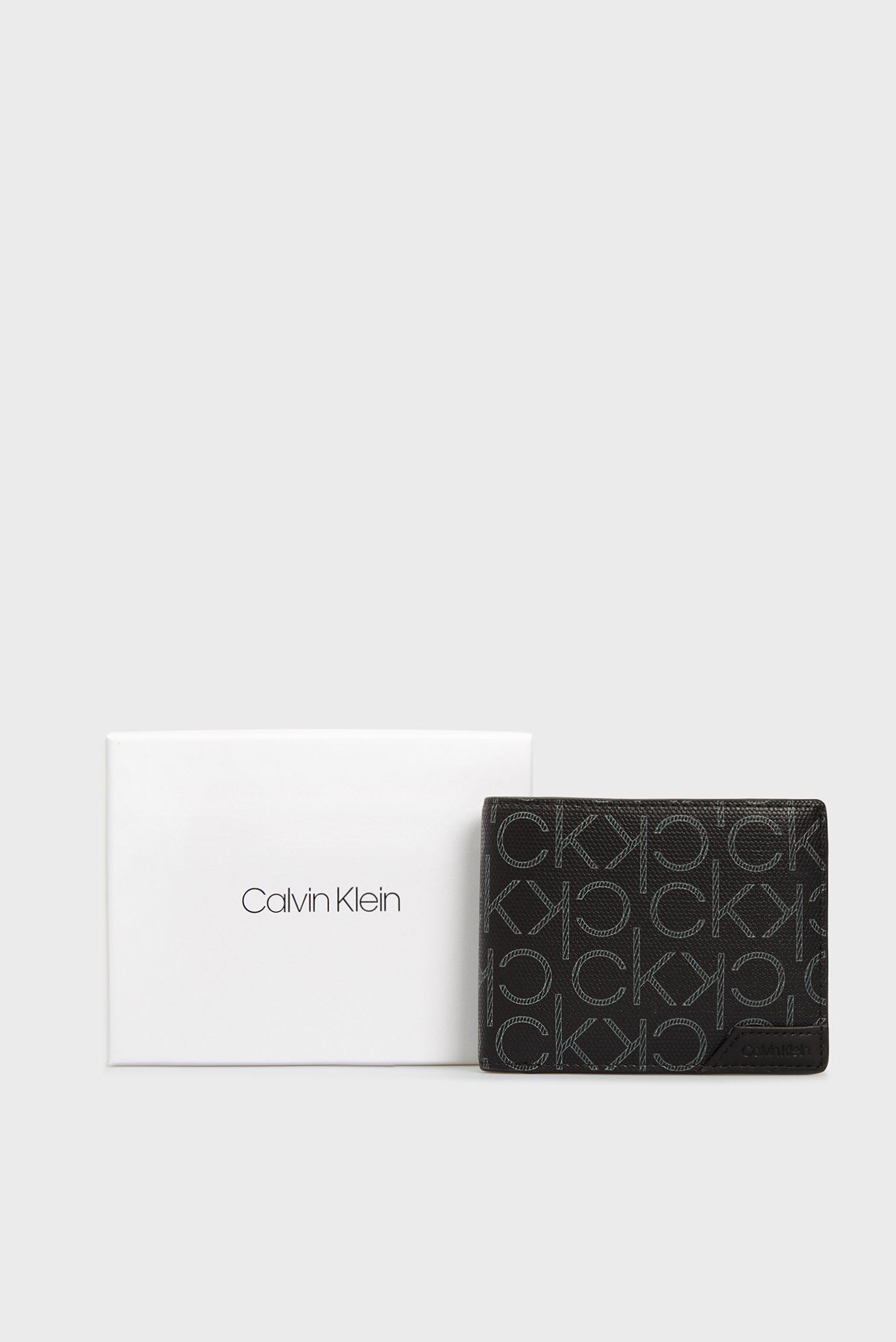 Мужской черный кожаный кошелек BIFOLD 5CC W/COIN Calvin Klein K50K507012 —  MD-Fashion