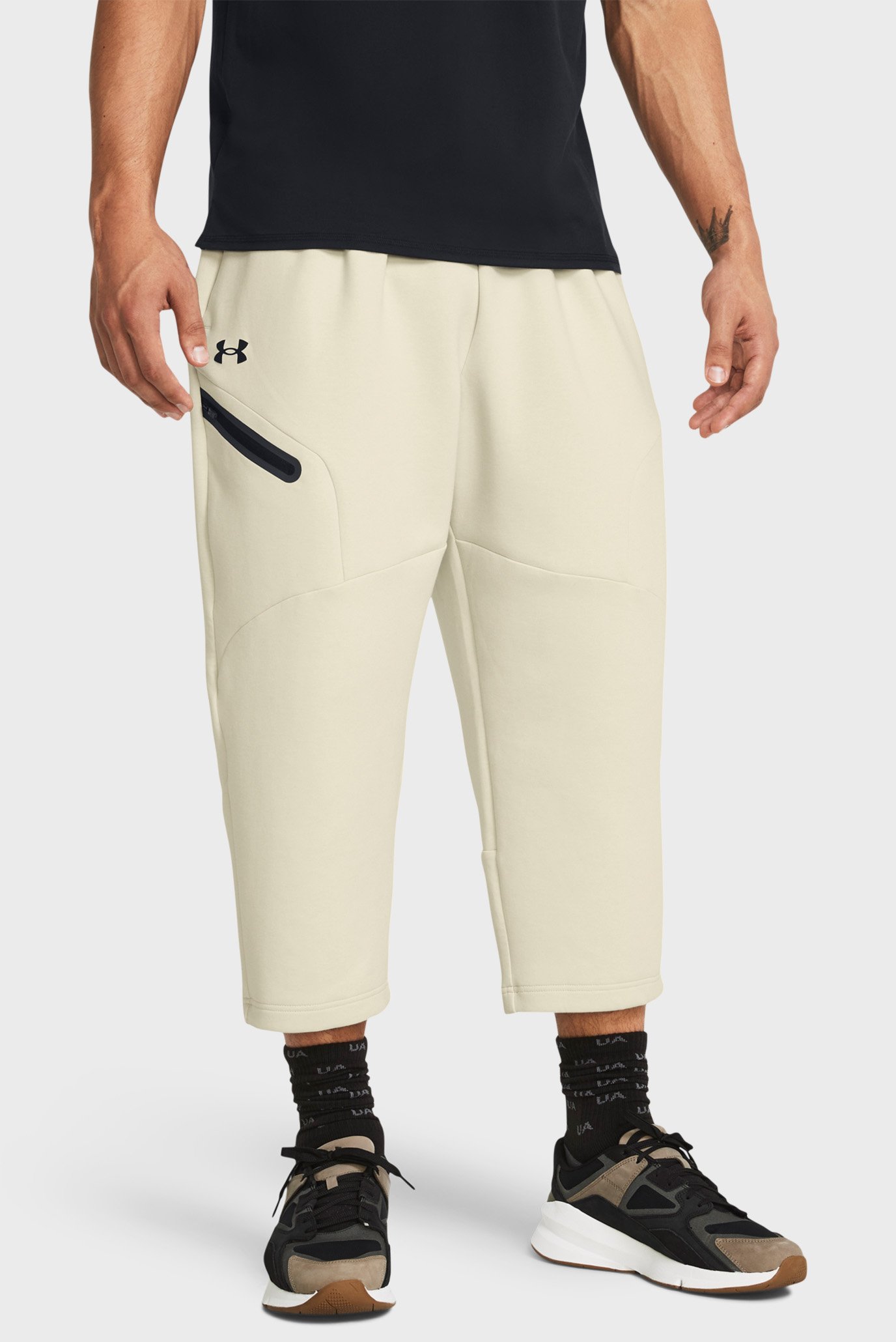 Мужские бежевые спортивные брюки Unstoppable Flc Baggy Crop 1
