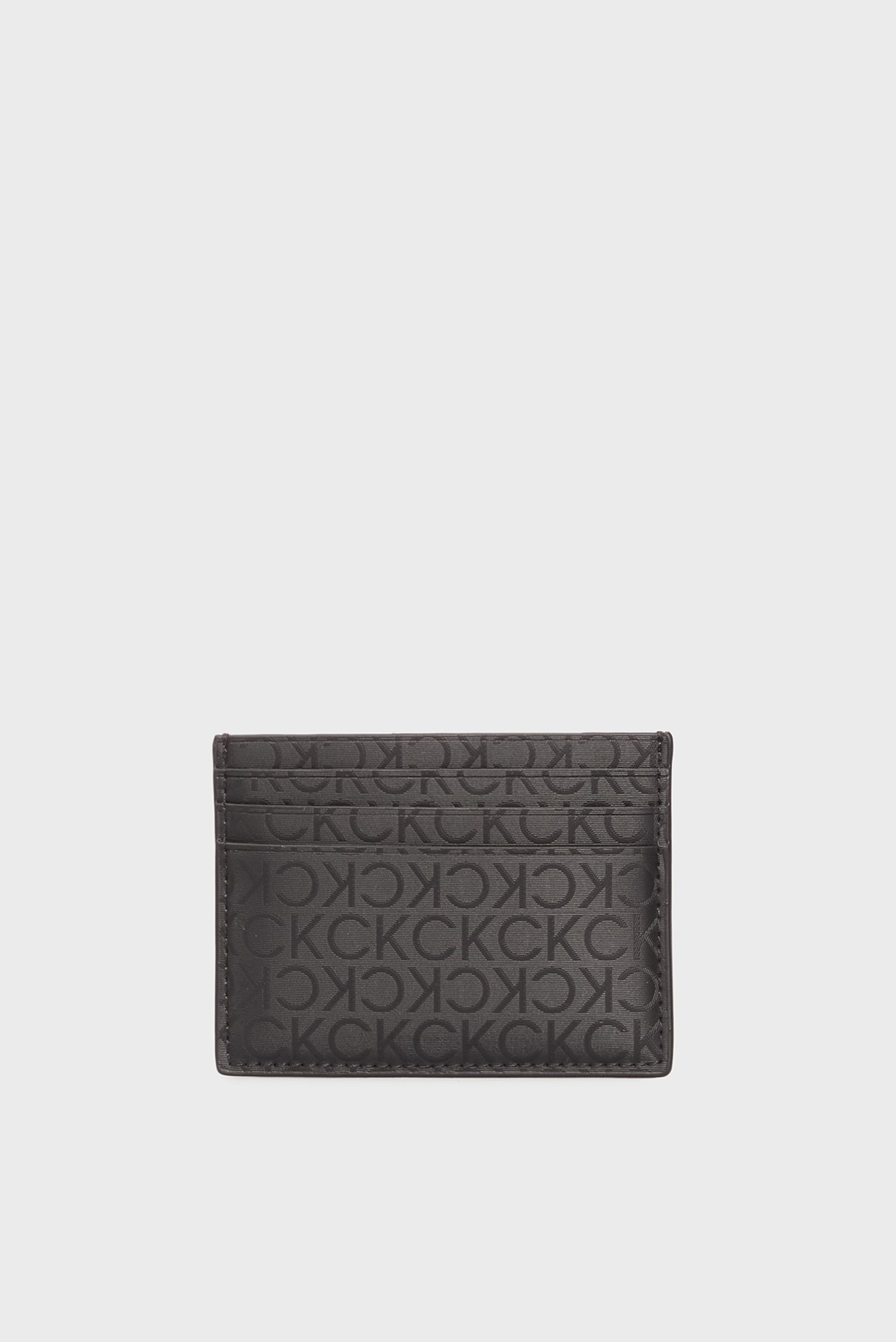 Мужской черный кардхолдер с узором CK SLEEK CARDHOLDER 6CC Черный ONESIZE Calvin Klein K50K512862 Мужской черный кардхолдер с узором CK SLEEK CARDHOLDER 6CC Черный ONESIZE Calvin Klein K50K512862