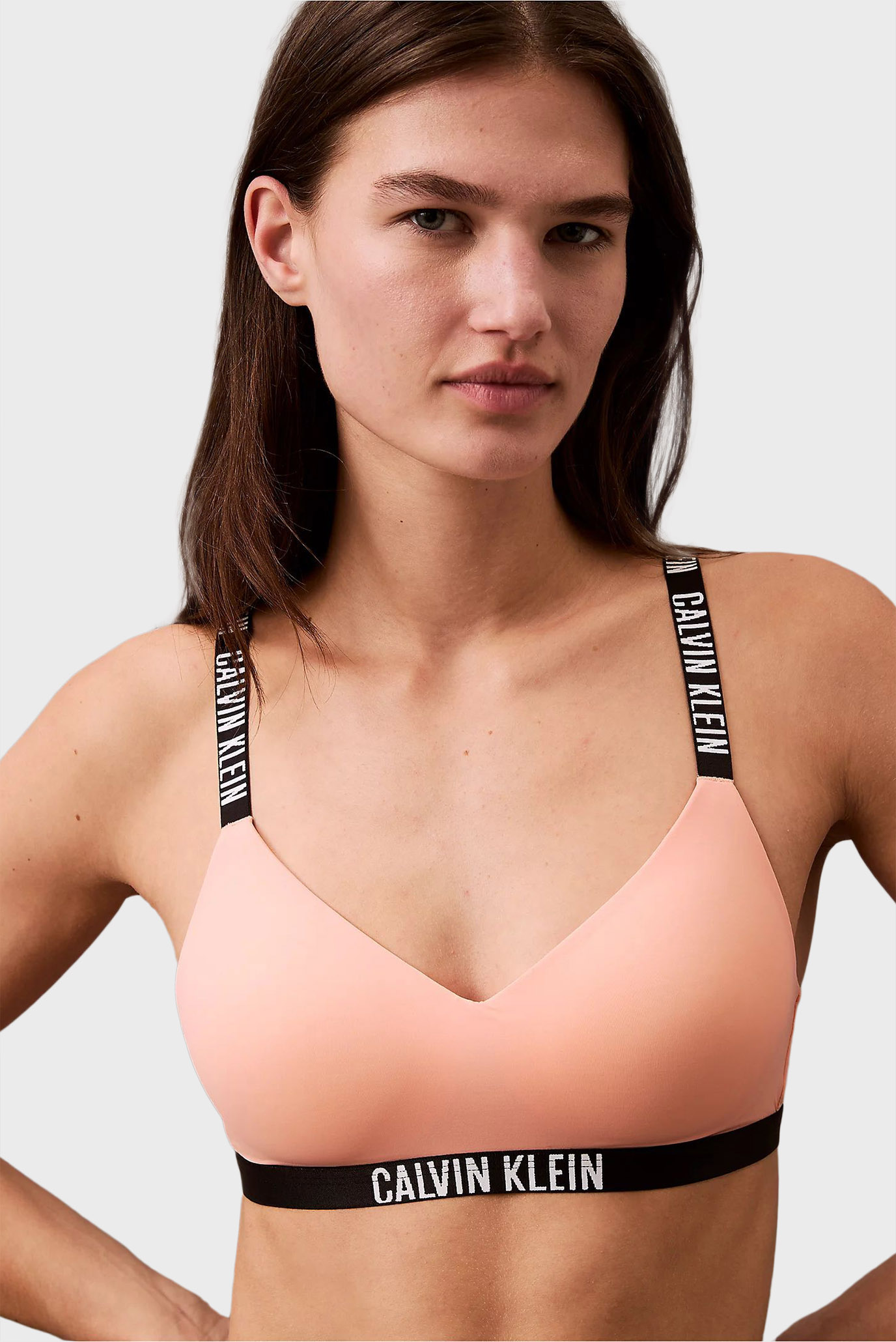 Женский персиковый бюстгальтер LGHTLY LINED BRALETTE Оранжевый S Calvin Klein 000QF7659E Женский персиковый бюстгальтер LGHTLY LINED BRALETTE Оранжевый S Calvin Klein 000QF7659E