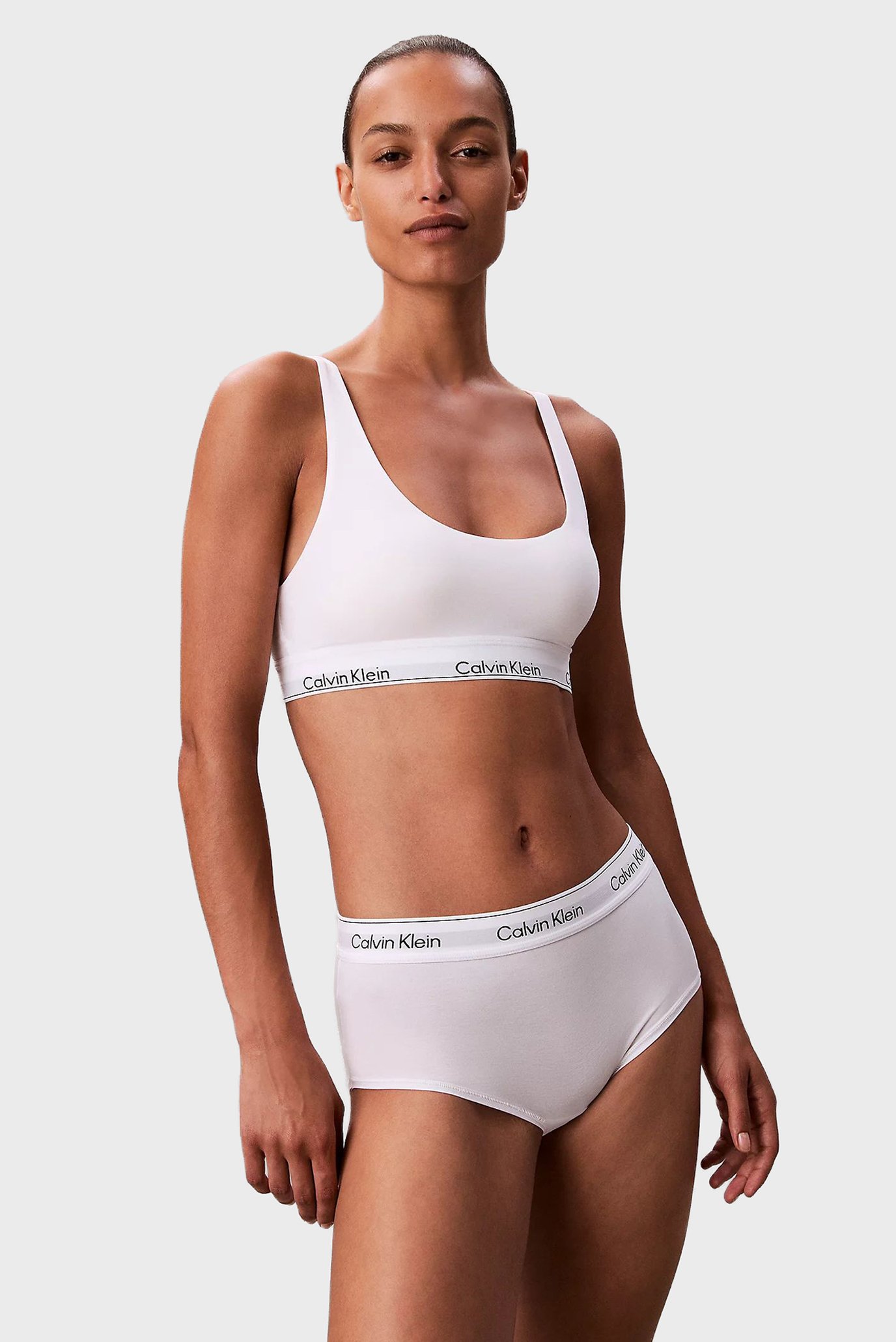 Женский белый бюстгальтер LIGHTLY LINED BRALETTE Белый M Calvin Klein LV00QF8503 Женский белый бюстгальтер LIGHTLY LINED BRALETTE Белый M Calvin Klein LV00QF8503