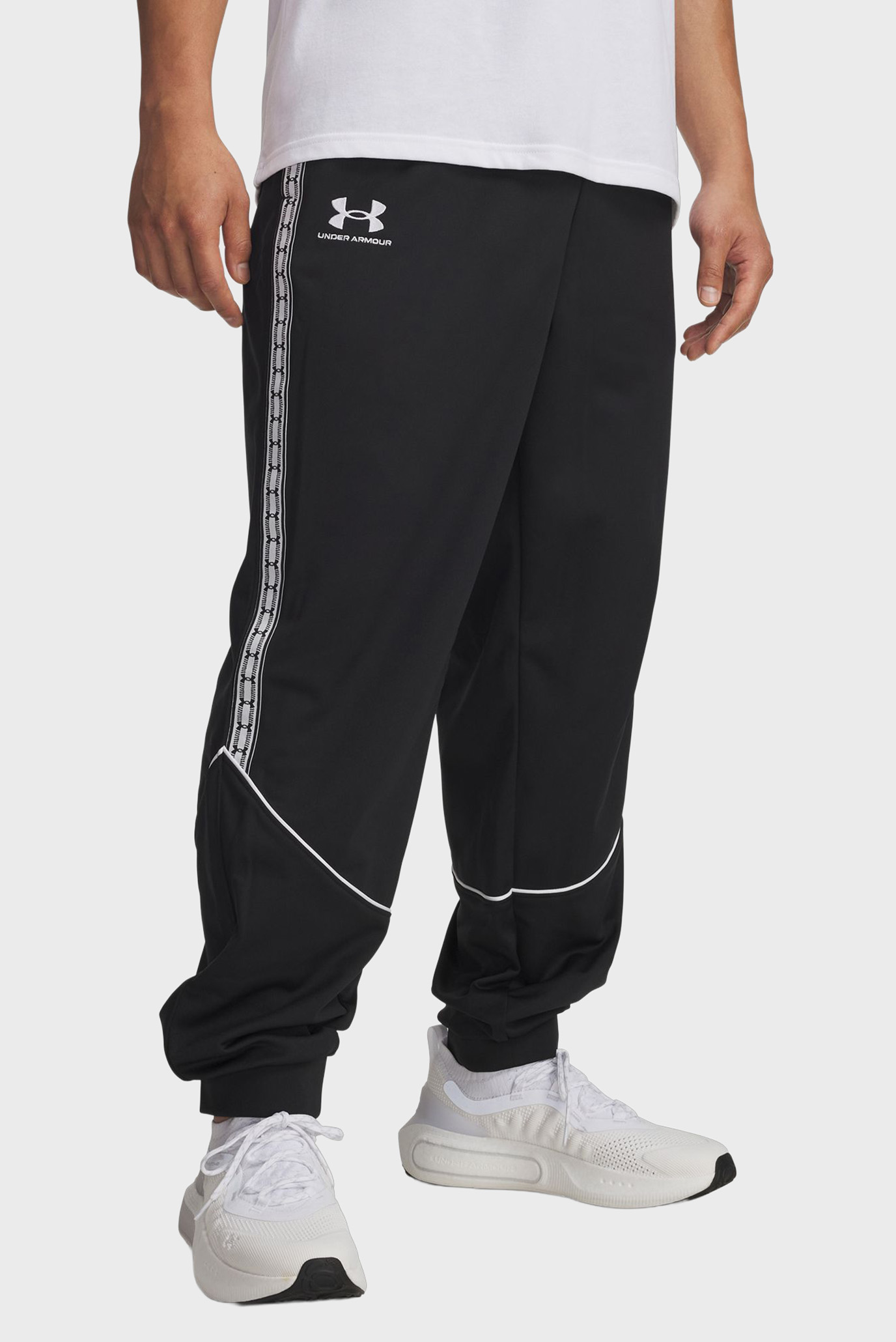Мужские черные спортивные брюки UA M 96 Terrace Pants Черный S Under Armour 6005127-001 Мужские черные спортивные брюки UA M 96 Terrace Pants Черный S Under Armour 6005127-001